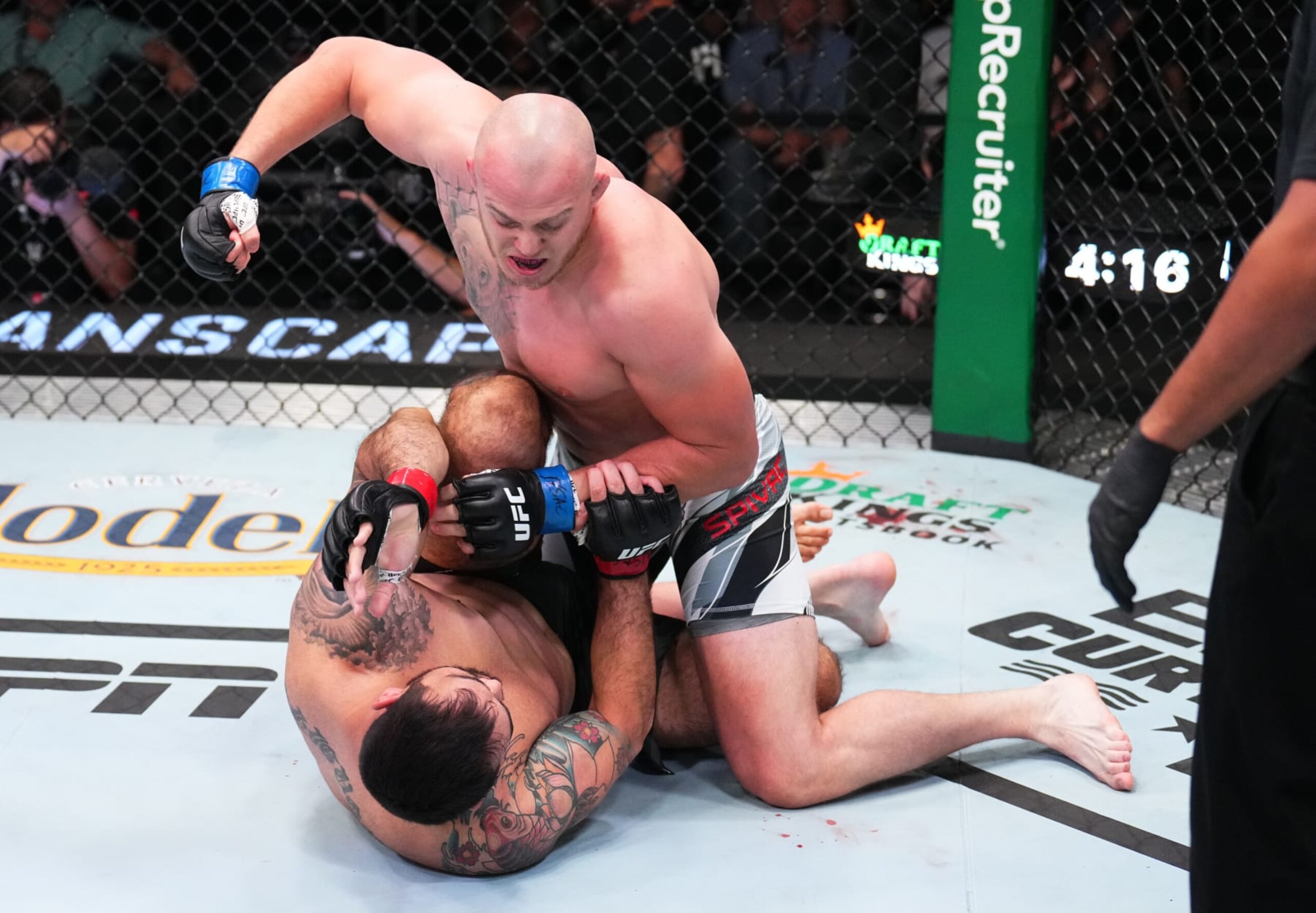 LAS VEGAS, NEVADA - AUGUST 06: (R-L) Serghei Spivac of Moldova punches Augusto Sakai of Brazil in a heavyweight fight during the UFC Fight Night event at UFC APEX on August 06, 2022 in Las Vegas, Nevada. (Photo by Chris Unger/Zuffa LLC)