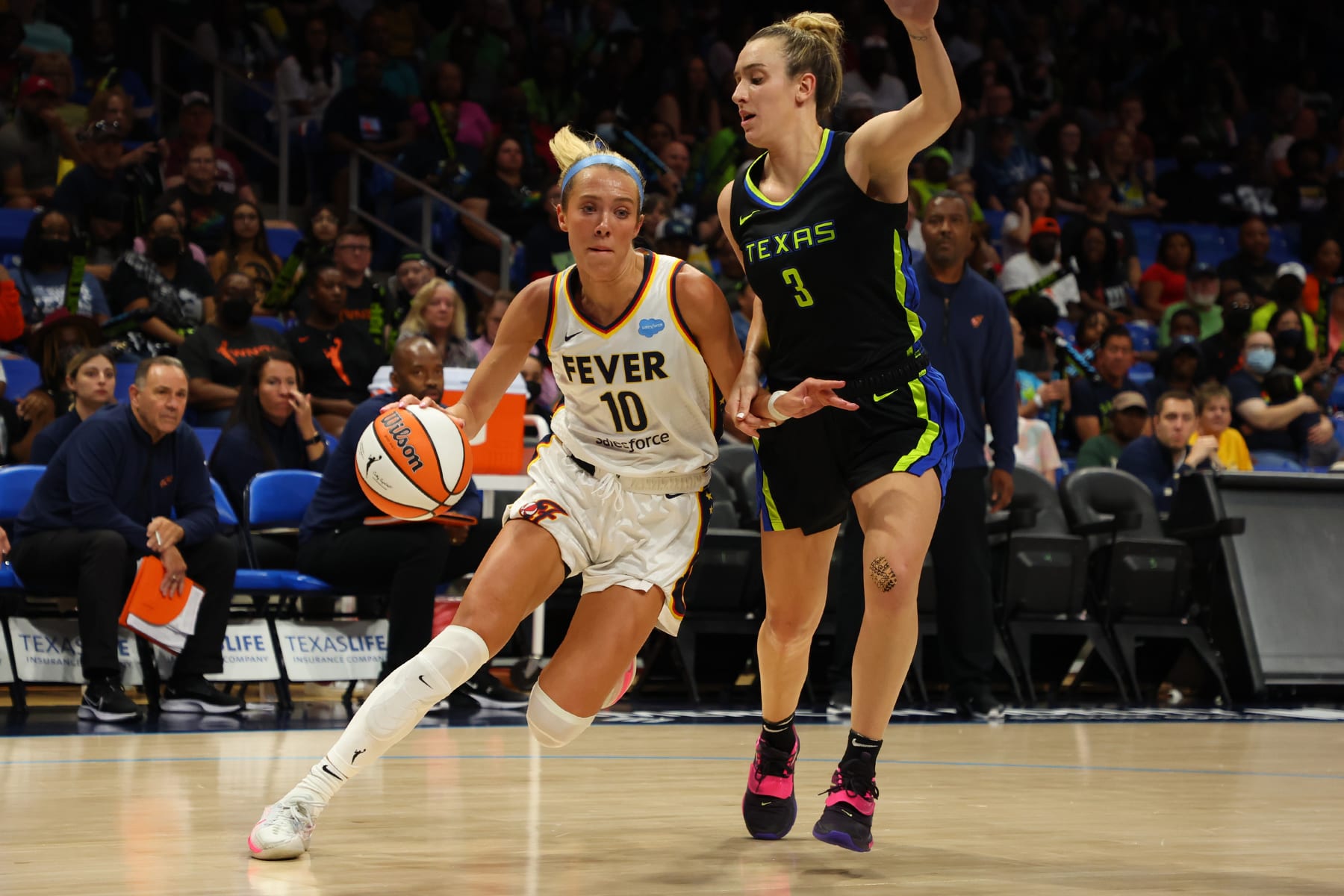 ARLINGTON, TX - AUGUST 6: Lexie Hull #10 of the Indiana Fever handles the ball during the game against the Dallas Wings on August 6, 2022 at the College Park Center in Arlington, Texas. NOTE TO USER: User expressly acknowledges and agrees that, by downloading and/or using this Photograph, user is consenting to the terms and conditions of the Getty Images License Agreement. Mandatory Copyright Notice: Copyright 2022 NBAE (Photo by Richard Rodriguez/NBAE via Getty Images)