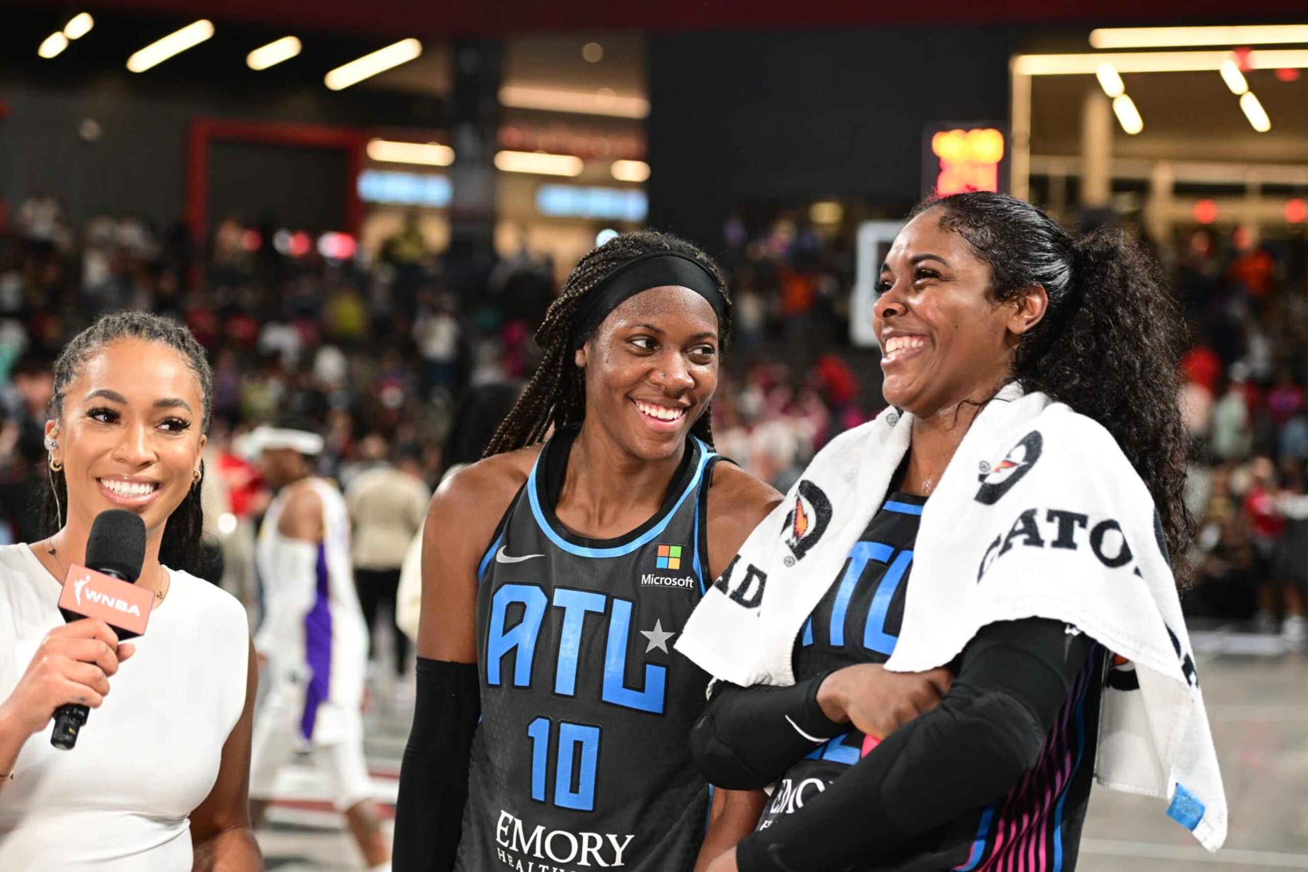 ATLANTA, GA - AUGUST 5: Cheyenne Parker #32 and Rhyne Howard are interviewed Parker scored the game winning basket during the game against the Los Angeles Sparks on August 5, 2022 at Gateway Center Arena in College Park, Georgia.  NOTE TO USER: User expressly acknowledges and agrees that, by downloading and/or using this Photograph, user is consenting to the terms and conditions of the Getty Images License Agreement. Mandatory Copyright Notice: Copyright 2022 NBAE (Photo by Adam Hagy/NBAE via Getty Images)