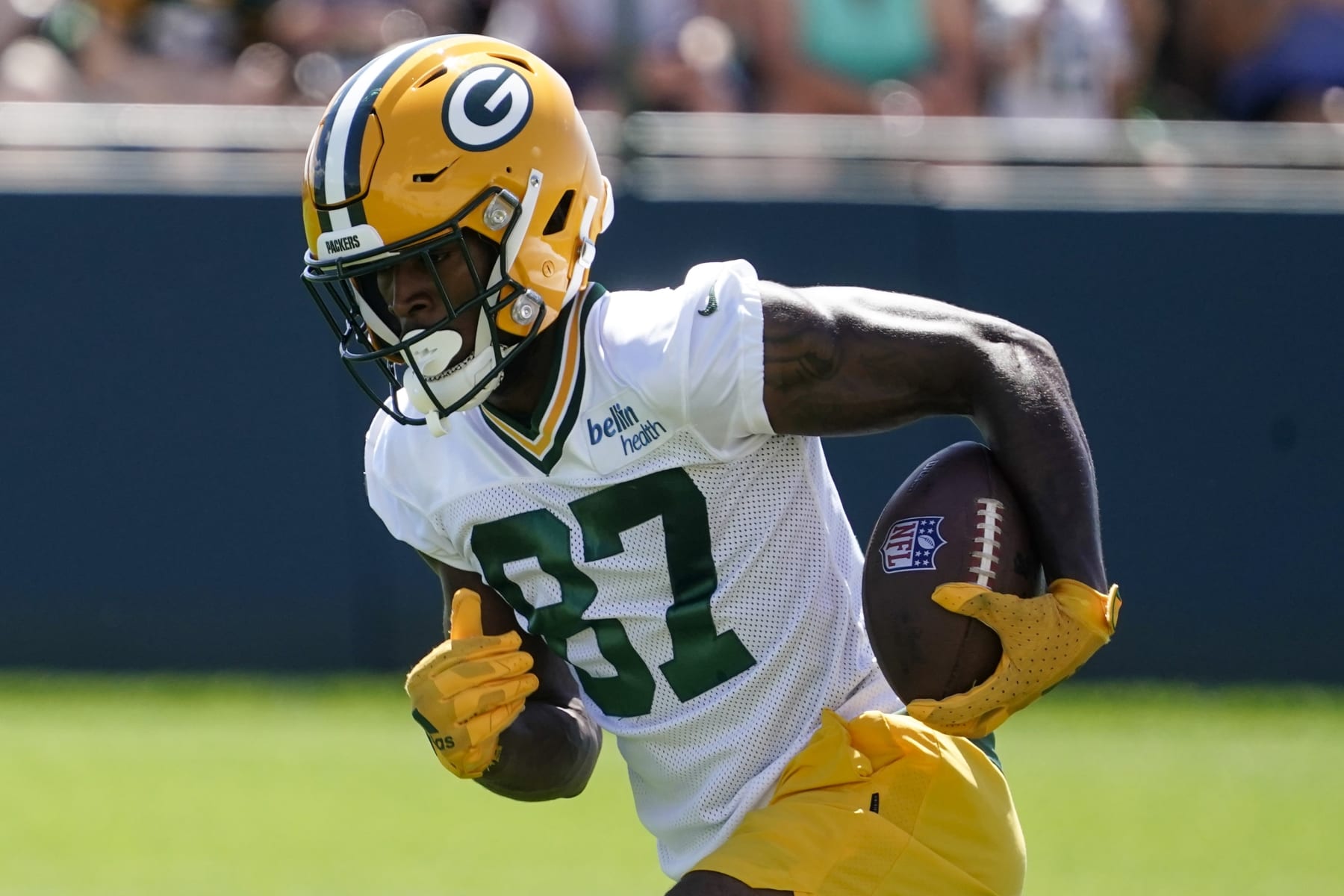 Green Bay Packers' Romeo Doubs runs a drill at the NFL football team's practice field Saturday, July 30, 2022, in Green Bay, Wis. (AP Photo/Morry Gash)