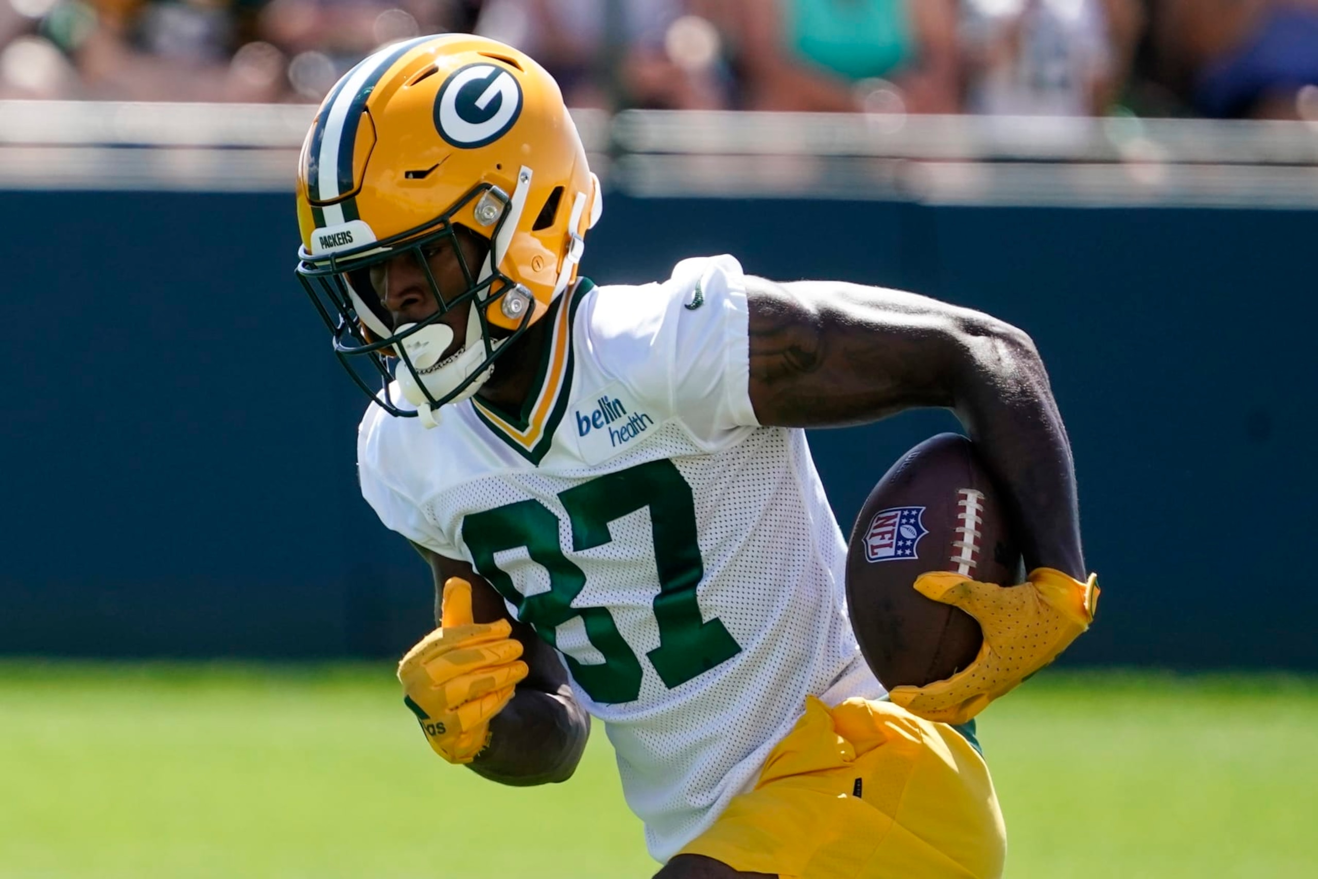 Green Bay Packers' Romeo Doubs runs a drill at the NFL football team's practice field Saturday, July 30, 2022, in Green Bay, Wis. (AP Photo/Morry Gash)
