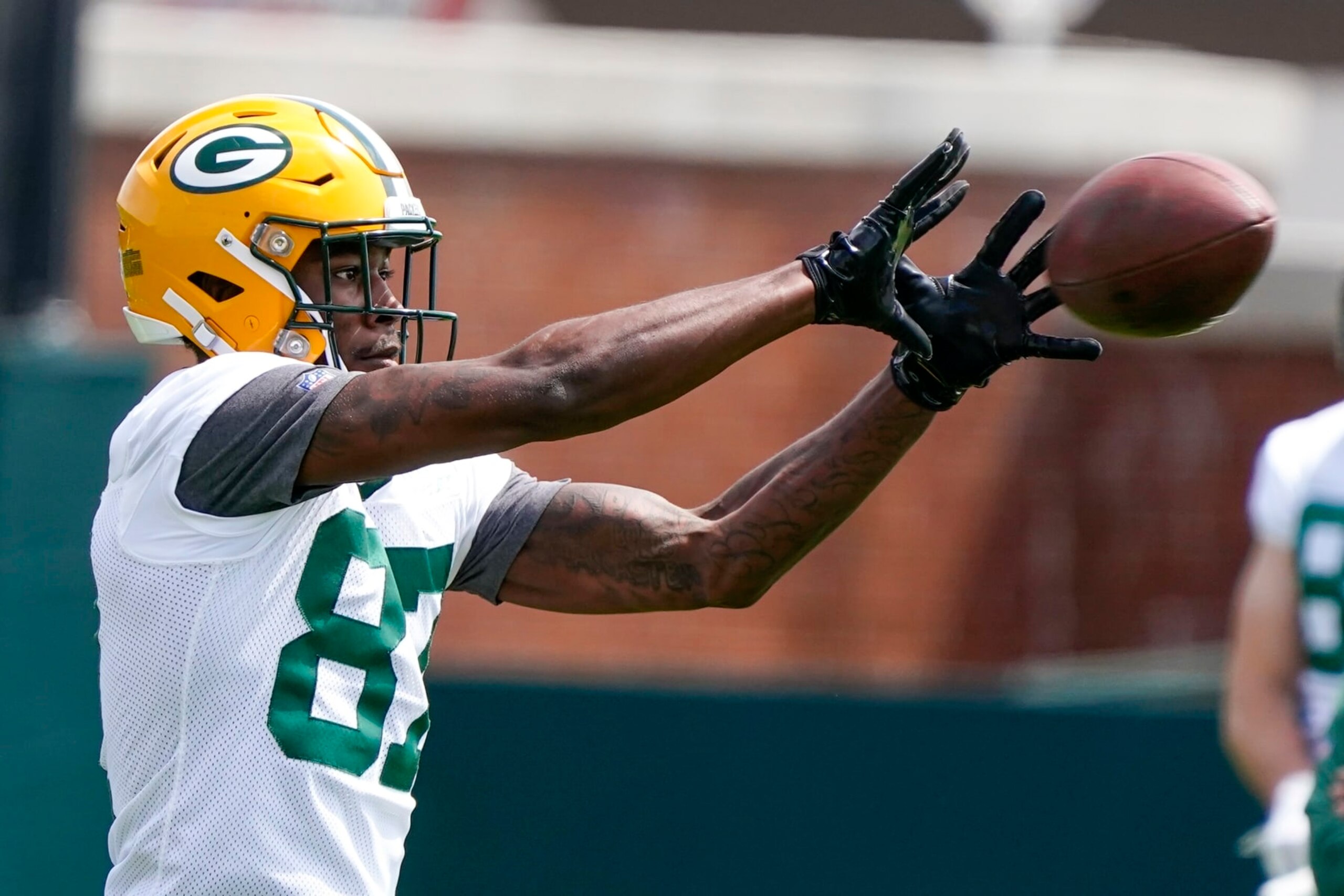 FILE - Green Bay Packers' Romeo Doubs runs a drill during the NFL football team's training camp on May 24, 2022, in Green Bay, Wis. Christian Watson’s injury has put more of a spotlight on rookie receiver Romeo Doubs, a fourth-round pick who is making the most of his opportunity. (AP Photo/Morry Gash, File)