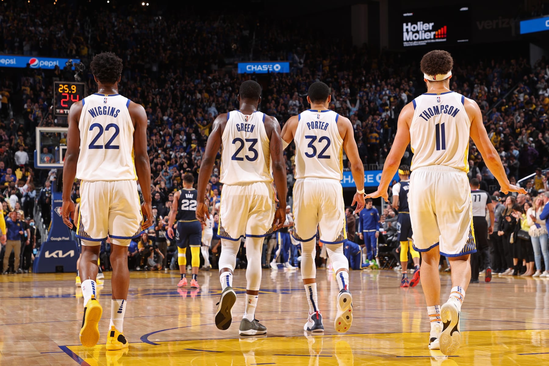 SAN FRANCISCO, CA - MAY 9: Andrew Wiggins #22, Draymond Green #23, Otto Porter Jr. #32 and Klay Thompson #11 of the Golden State Warriors looks on during the game against the Memphis Grizzlies during Game 4 of the 2022 NBA Playoffs Western Conference Semifinals on May 9, 2022 at Chase Center in San Francisco, California. NOTE TO USER: User expressly acknowledges and agrees that, by downloading and or using this photograph, user is consenting to the terms and conditions of Getty Images License Agreement. Mandatory Copyright Notice: Copyright 2022 NBAE (Photo by Joe Murphy/NBAE via Getty Images)