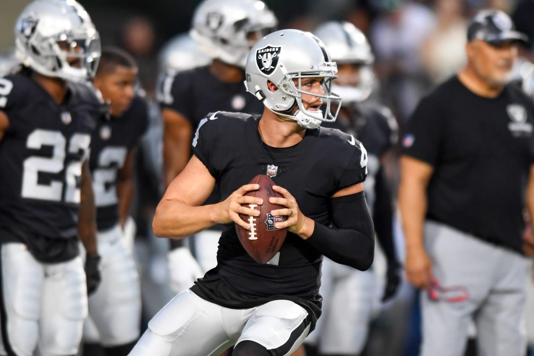CANTON, OHIO - AUGUST 04: Derek Carr #4 of the Las Vegas Raiders warms up prior to the 2022 Pro Hall of Fame Game against the Jacksonville Jaguars at Tom Benson Hall of Fame Stadium on August 04, 2022 in Canton, Ohio. (Photo by Nick Cammett/Getty Images)