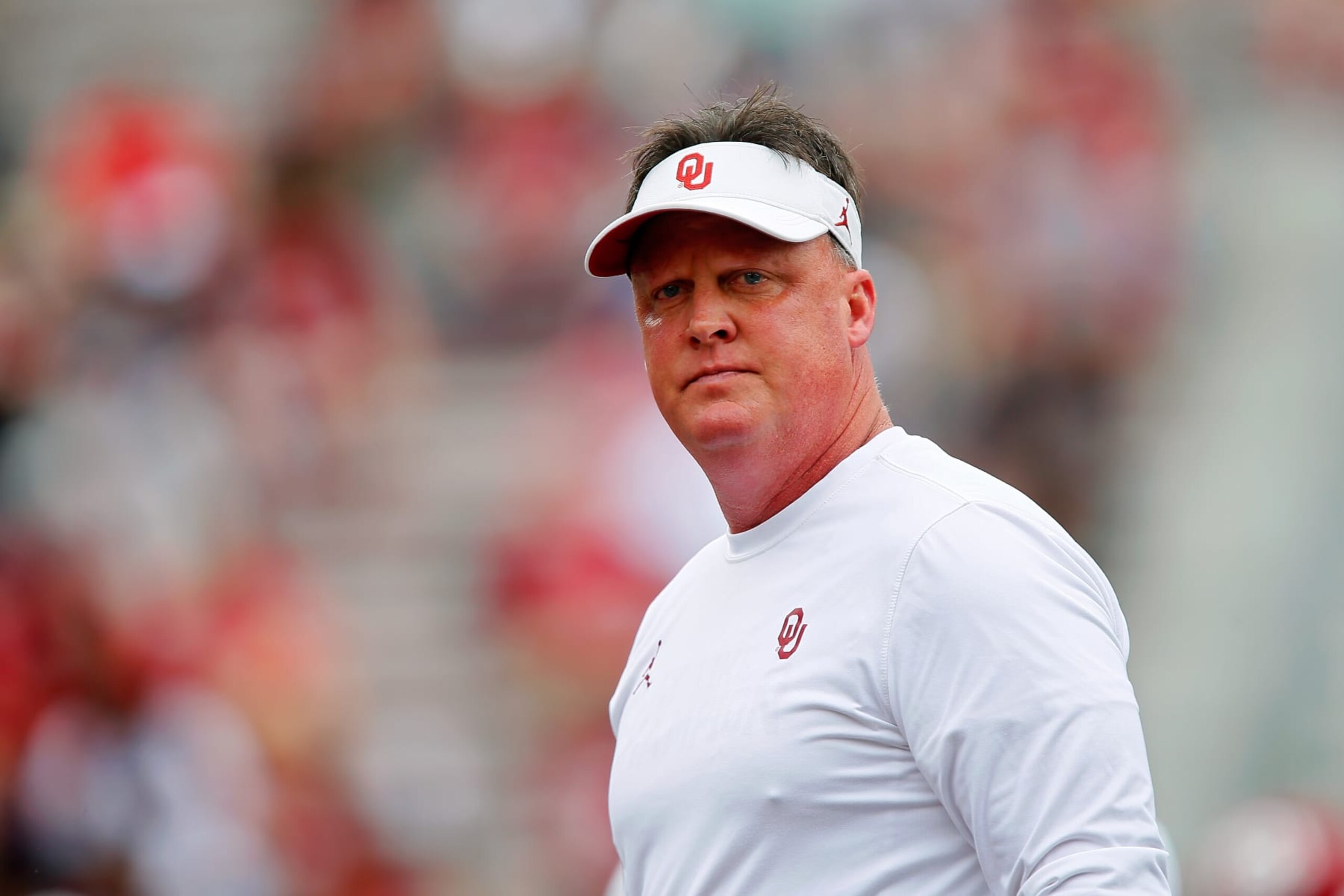 NORMAN, OK - APRIL 23:  Assistant Head coach Cale Gundy of the Oklahoma Sooners watches the team before their spring game at Gaylord Family Oklahoma Memorial Stadium on April 23, 2022 in Norman, Oklahoma.   (Photo by Brian Bahr/Getty Images)