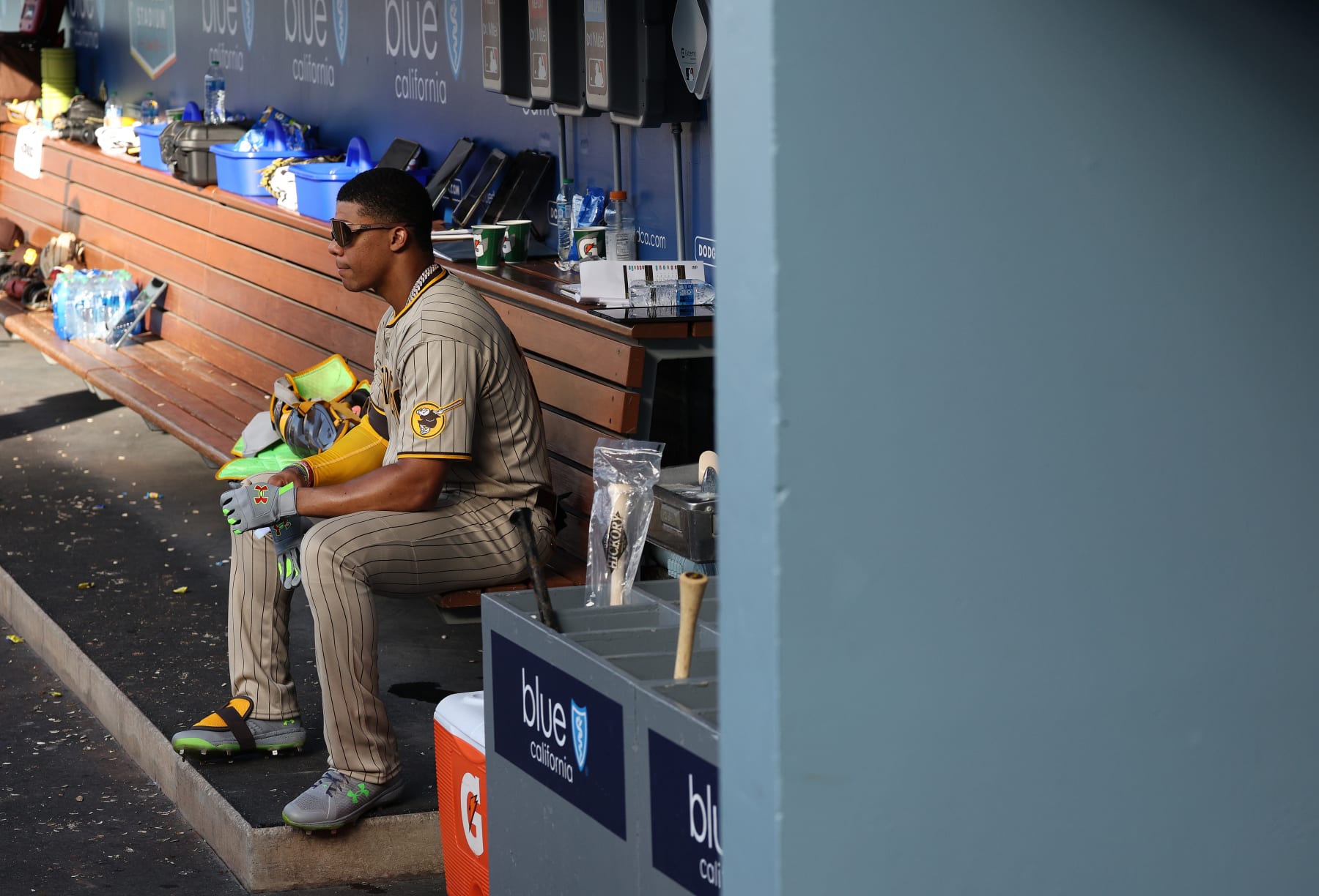LOS ANGELES, CALIFORNIA - AUGUST 07: Juan Soto #22 of the San Diego Padres waits on the bench during a 4-0 loss to the Los Angeles Dodgers at Dodger Stadium on August 07, 2022 in Los Angeles, California. (Photo by Harry How/Getty Images)