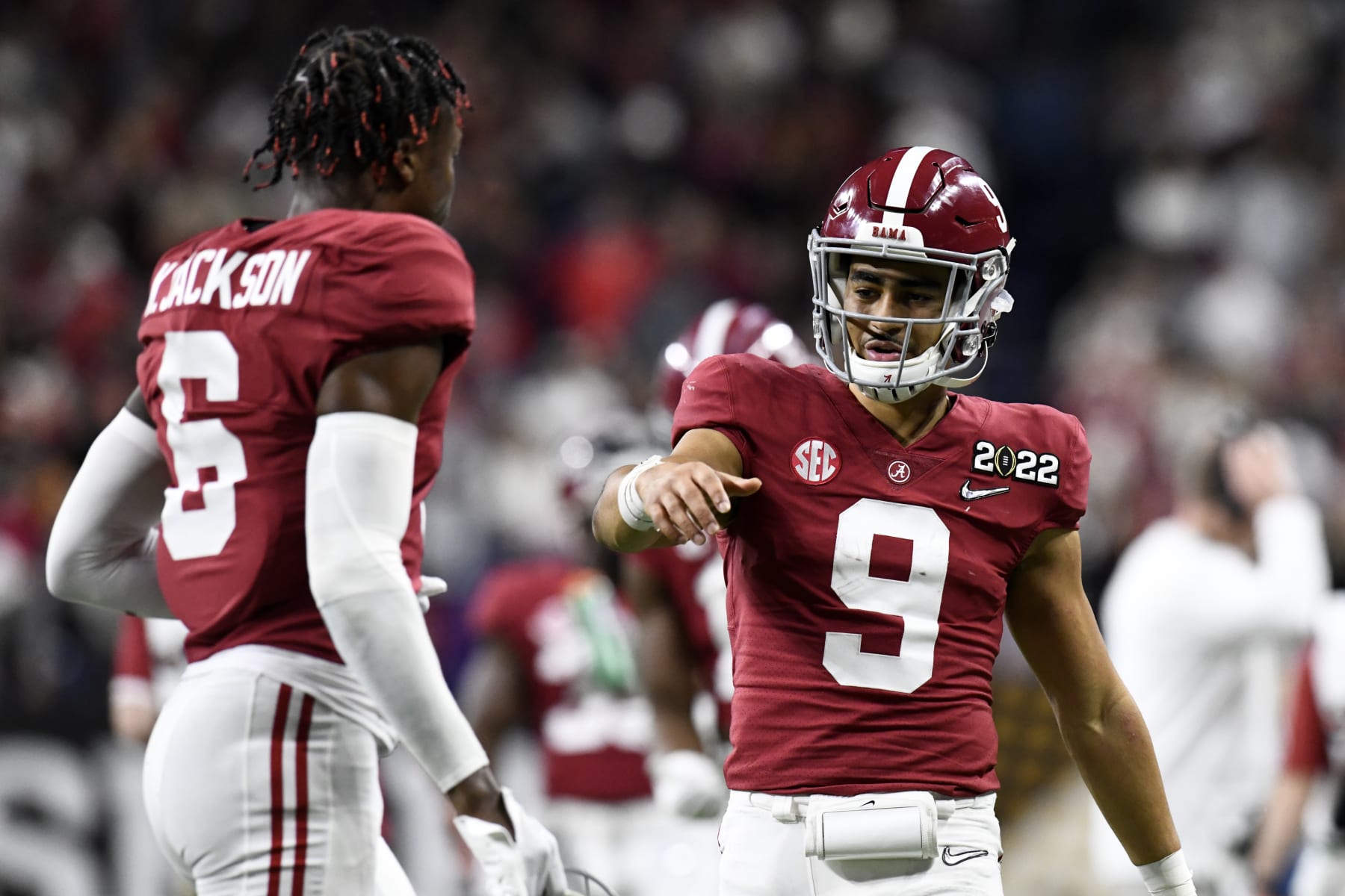 INDIANAPOLIS, IN - JANUARY 10: Alabama Crimson Tide QB Bryce Young (9) high fives Alabama Crimson Tide DB Khyree Jackson (6) during the Alabama Crimson Tide versus the Georgia Bulldogs in the College Football Playoff National Championship, on January 10, 2022, at Lucas Oil Stadium in Indianapolis, IN. (Photo by Michael Allio/Icon Sportswire via Getty Images)