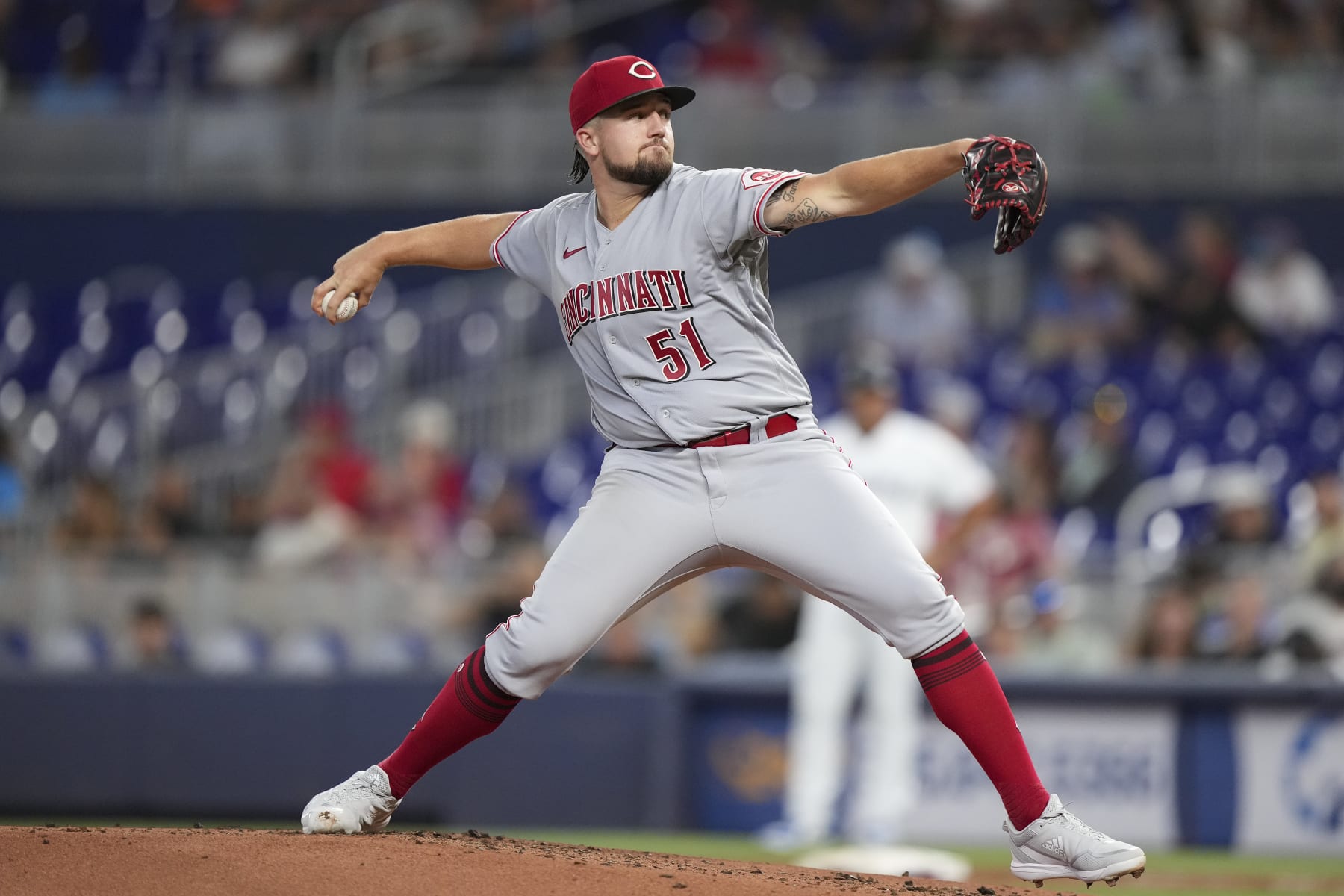 MIAMI, FLORIDA - AUGUST 02: Graham Ashcraft #51 of the Cincinnati Reds throws a pitch during the third inning against the Miami Marlins at loanDepot park on August 02, 2022 in Miami, Florida. (Photo by Eric Espada/Getty Images)
