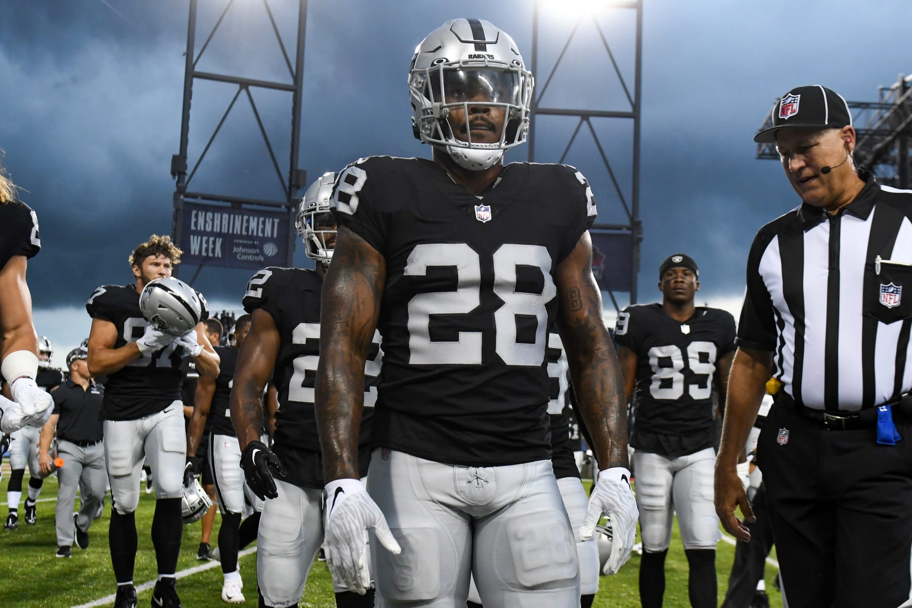 CANTON, OHIO - AUGUST 04: Josh Jacobs #28 of the Las Vegas Raiders walks off the field after severe weather delays the start of the 2022 Pro Hall of Fame Game against the at Tom Benson Hall of Fame Stadium on August 04, 2022 in Canton, Ohio. (Photo by Nick Cammett/Getty Images)