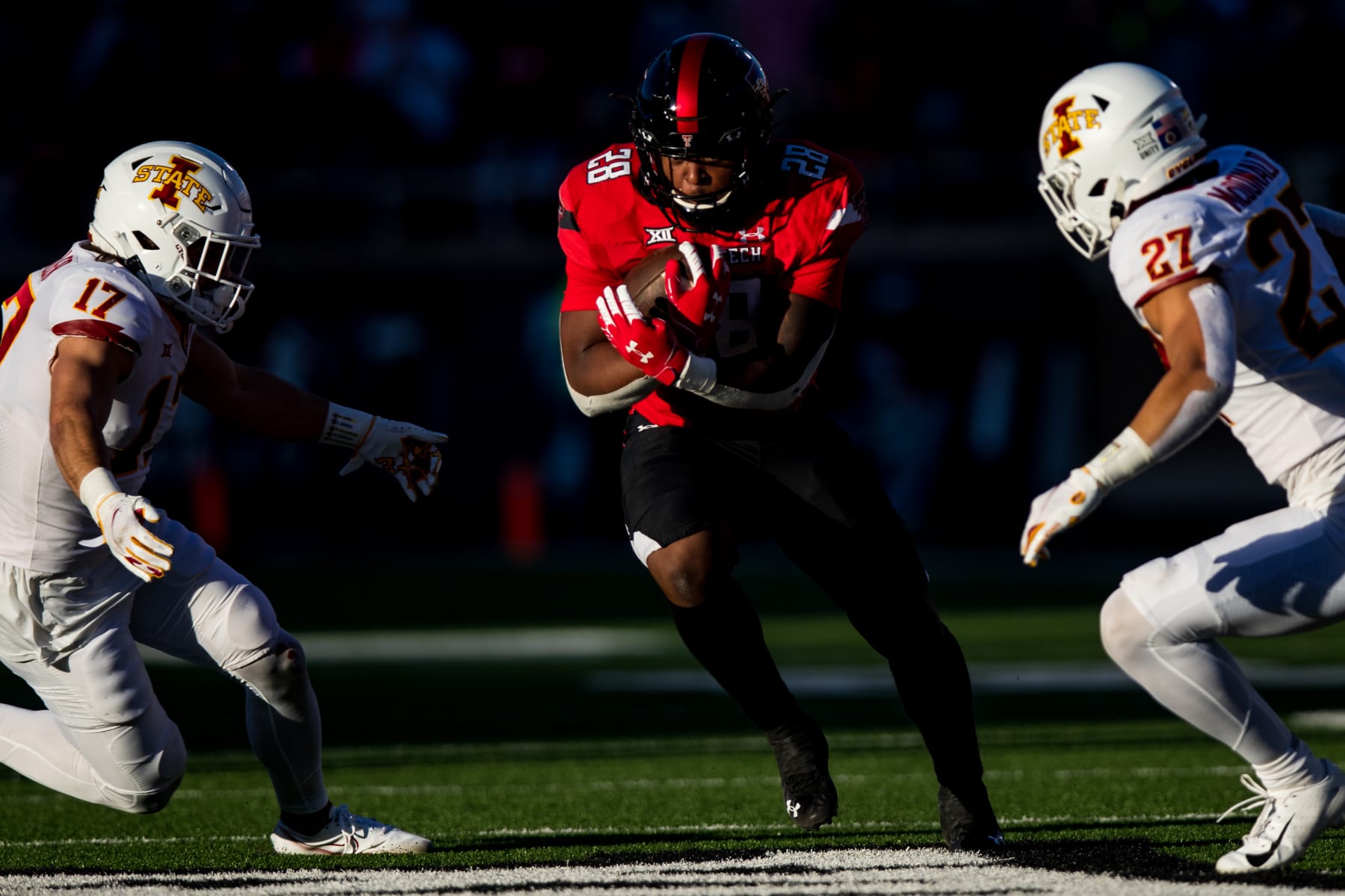 LUBBOCK, TEXAS - NOVEMBER 13: Running back Tahj Brooks #28 of the Texas Tech Red Raiders runs the ball during the second half of the college football game against the Iowa State Cyclones at Jones AT&T Stadium on November 13, 2021 in Lubbock, Texas. (Photo by John E. Moore III/Getty Images)
