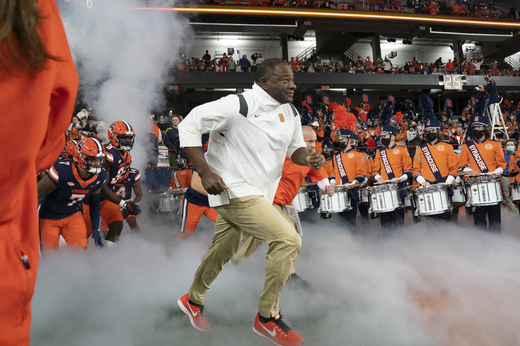 SYRACUSE, NY - NOVEMBER 27: Syracuse Orange Head Coach Dino Babers runs onto the field prior to the College Football game between the Pittsburgh Panthers and the Syracuse Orange on November 27, 2021, at the Carrier Dome in Syracuse, NY. (Photo by Gregory Fisher/Icon Sportswire via Getty Images)
