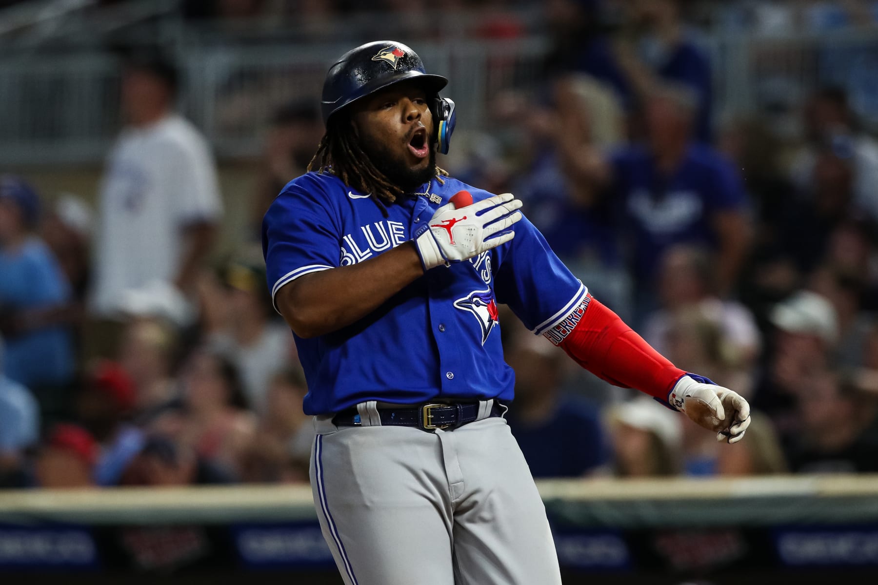 MINNEAPOLIS, MN - AUGUST 05: Vladimir Guerrero Jr. #27 of the Toronto Blue Jays celebrates his two-run home run against the Minnesota Twins in the sixth inning of the game at Target Field on August 5, 2022 in Minneapolis, Minnesota. The Twins defeated the Blue Jays 6-5 in ten innings. (Photo by David Berding/Getty Images)