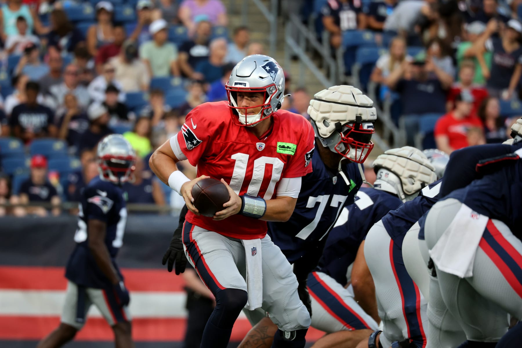 Foxborough, MA - August 5: Quarterback Mac Jones during the New England Patriots practice at Gillette Stadium. The Patriots held their annual in-stadium practice for season ticket members and Foxborough residents. (Photo by Craig F. Walker/The Boston Globe via Getty Images)