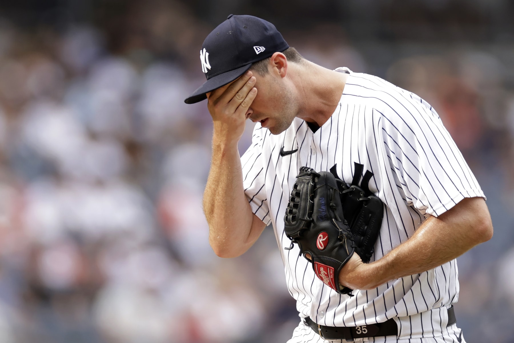 NEW YORK, NY - JULY 31: Clay Holmes #35 of the New York Yankees reacts after giving up a 3-run home run to Salvador Perez #13 of the Kansas City Royals during the ninth inning at Yankee Stadium on July 31, 2022 in the Bronx borough of New York City. The Royals won 8-6. (Photo by Adam Hunger/Getty Images)