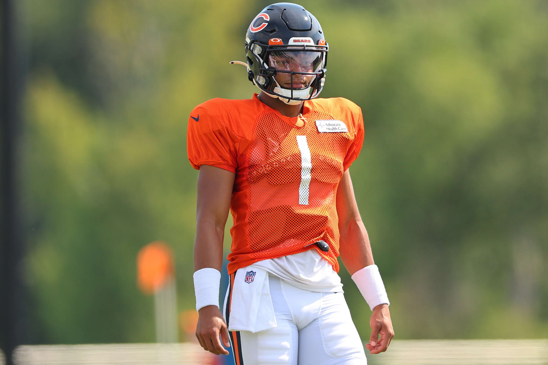 LAKE FOREST, ILLINOIS - AUGUST 02: Justin Fields #1 of the Chicago Bears looks on during training camp at the PNC Center at Halas Hall on August 02, 2022 in Lake Forest, Illinois. (Photo by Michael Reaves/Getty Images)