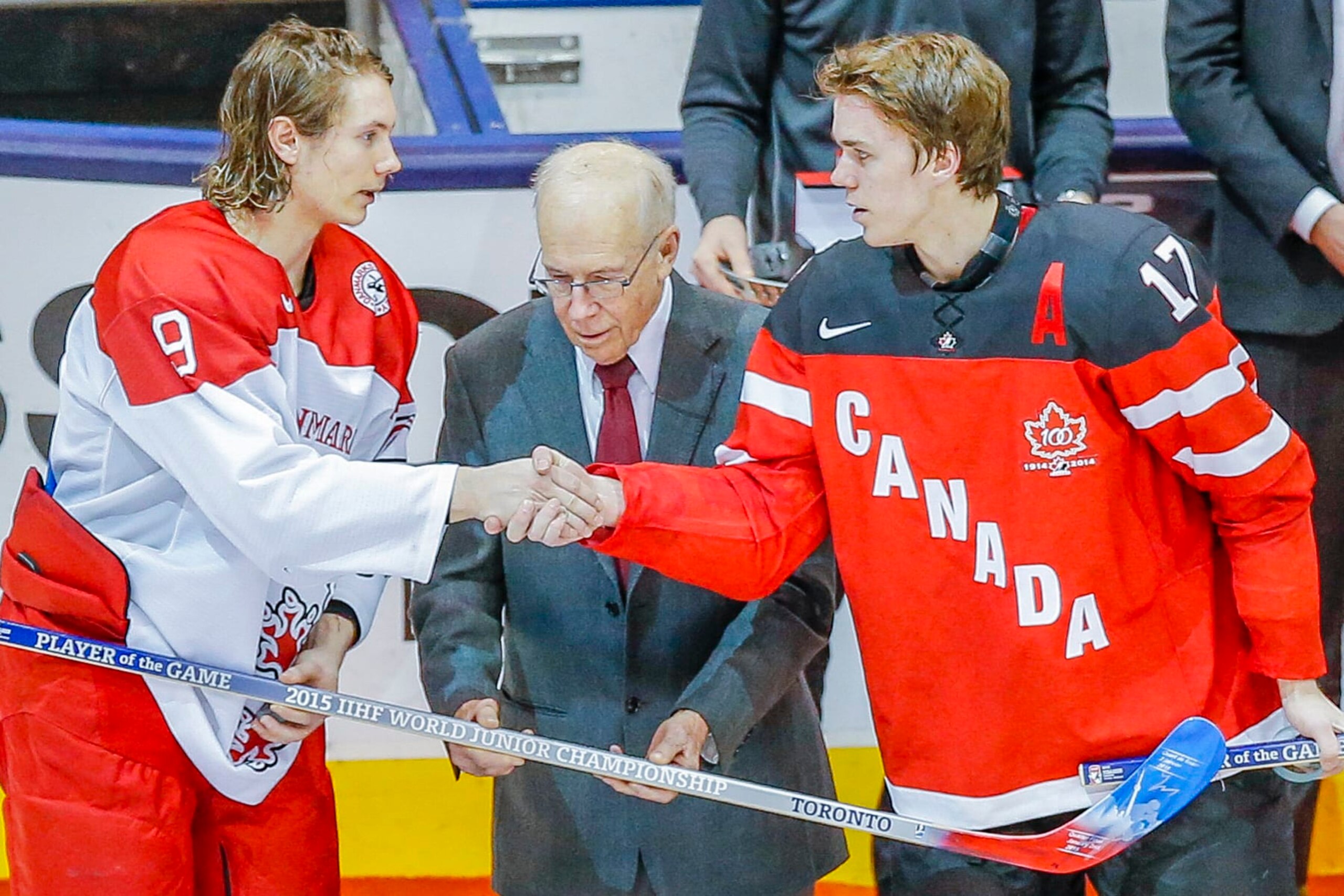 January 02 2015: Connor McDavid (17) of Team Canada and Nick Olesen (9) of Denmark shake hands after being named players of the game in Canada's 8-0 win over Denmark at the 2015 World Junior Championship at Air Canada Centre in Toronto, Canada. (Photo by John Crouch/Icon Sportswire/Corbis/Icon Sportswire via Getty Images)