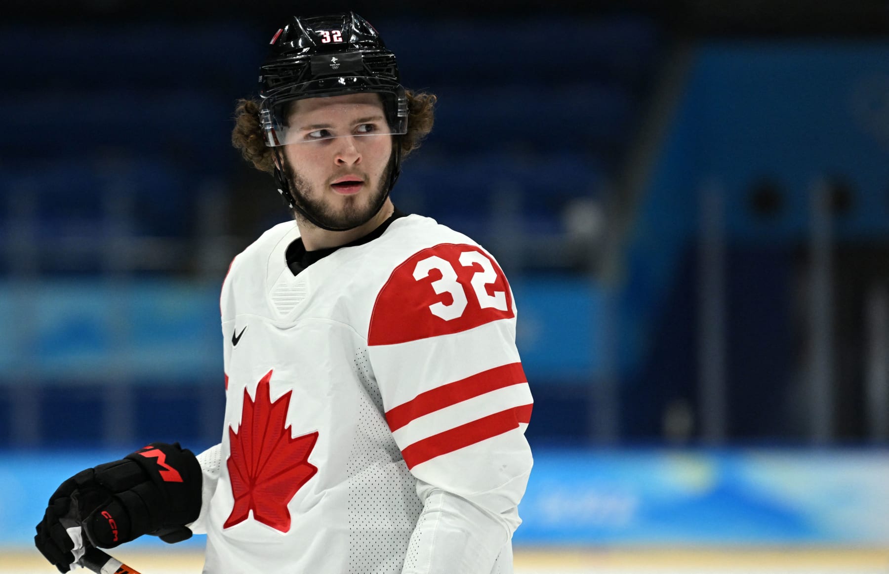 Canada's Mason McTavish looks on during the men's preliminary round group A match of the Beijing 2022 Winter Olympic Games ice hockey competition against China, at the National Indoor Stadium in Beijing on February 13, 2022. (Photo by Kirill KUDRYAVTSEV / AFP) (Photo by KIRILL KUDRYAVTSEV/AFP via Getty Images)