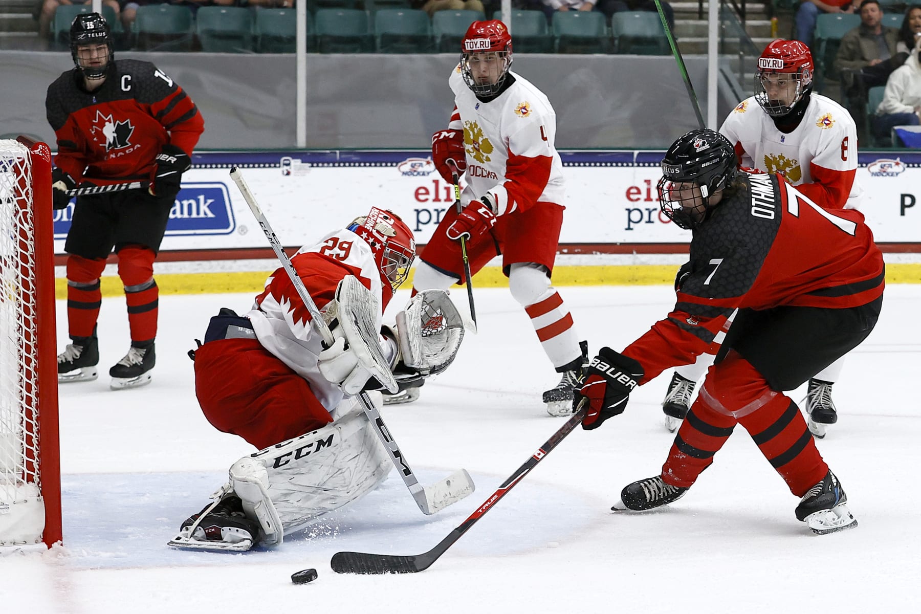 FRISCO, TEXAS - MAY 06:  Brennan Othmann #7 of Canada puts a shot on goal against Sergei Ivanov #29 of Russia in the first period during the 2021 IIHF Ice Hockey U18 World Championship Gold Medal Game at Comerica Center on May 06, 2021 in Frisco, Texas. (Photo by Tom Pennington/Getty Images)
