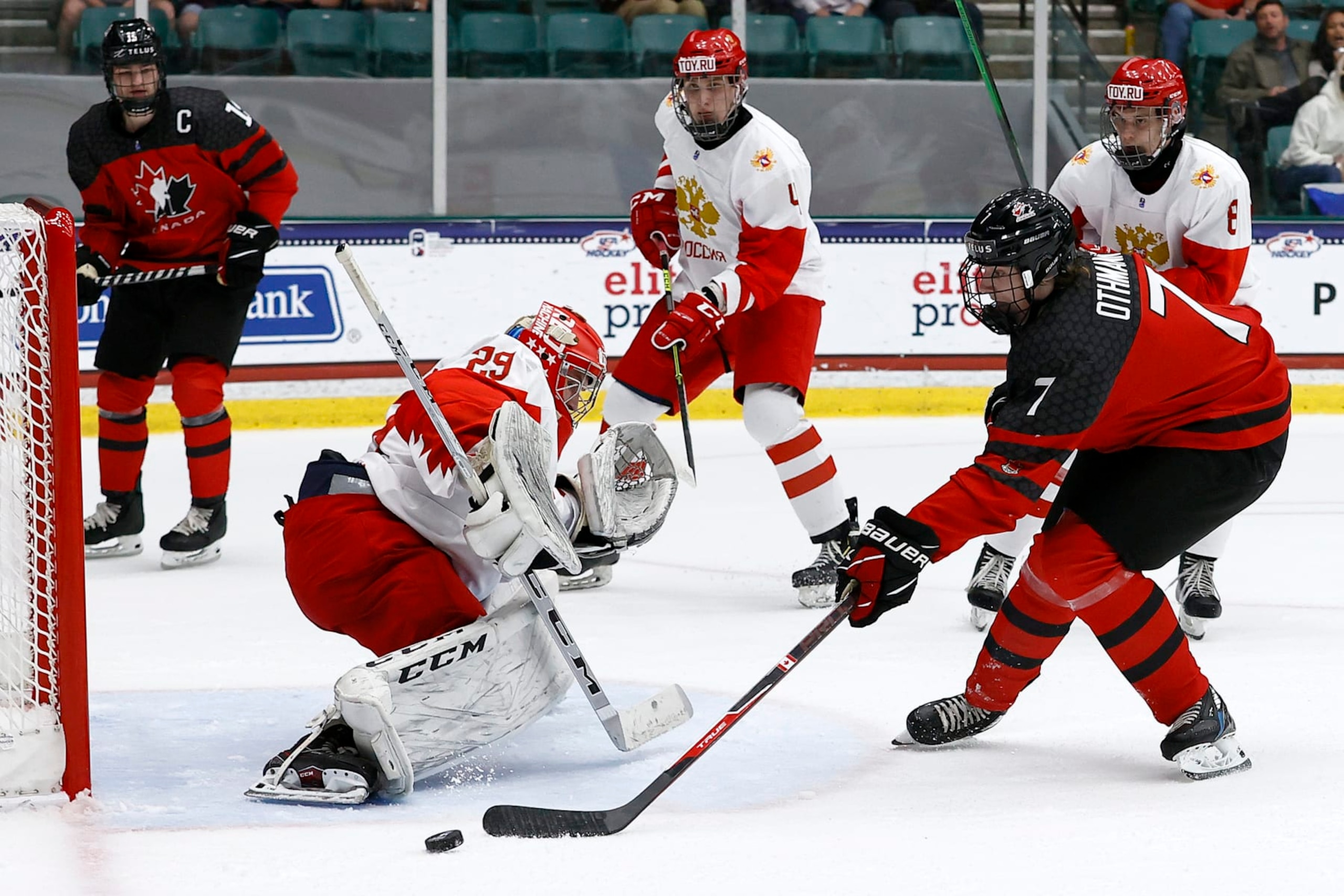FRISCO, TEXAS - MAY 06:  Brennan Othmann #7 of Canada puts a shot on goal against Sergei Ivanov #29 of Russia in the first period during the 2021 IIHF Ice Hockey U18 World Championship Gold Medal Game at Comerica Center on May 06, 2021 in Frisco, Texas. (Photo by Tom Pennington/Getty Images)