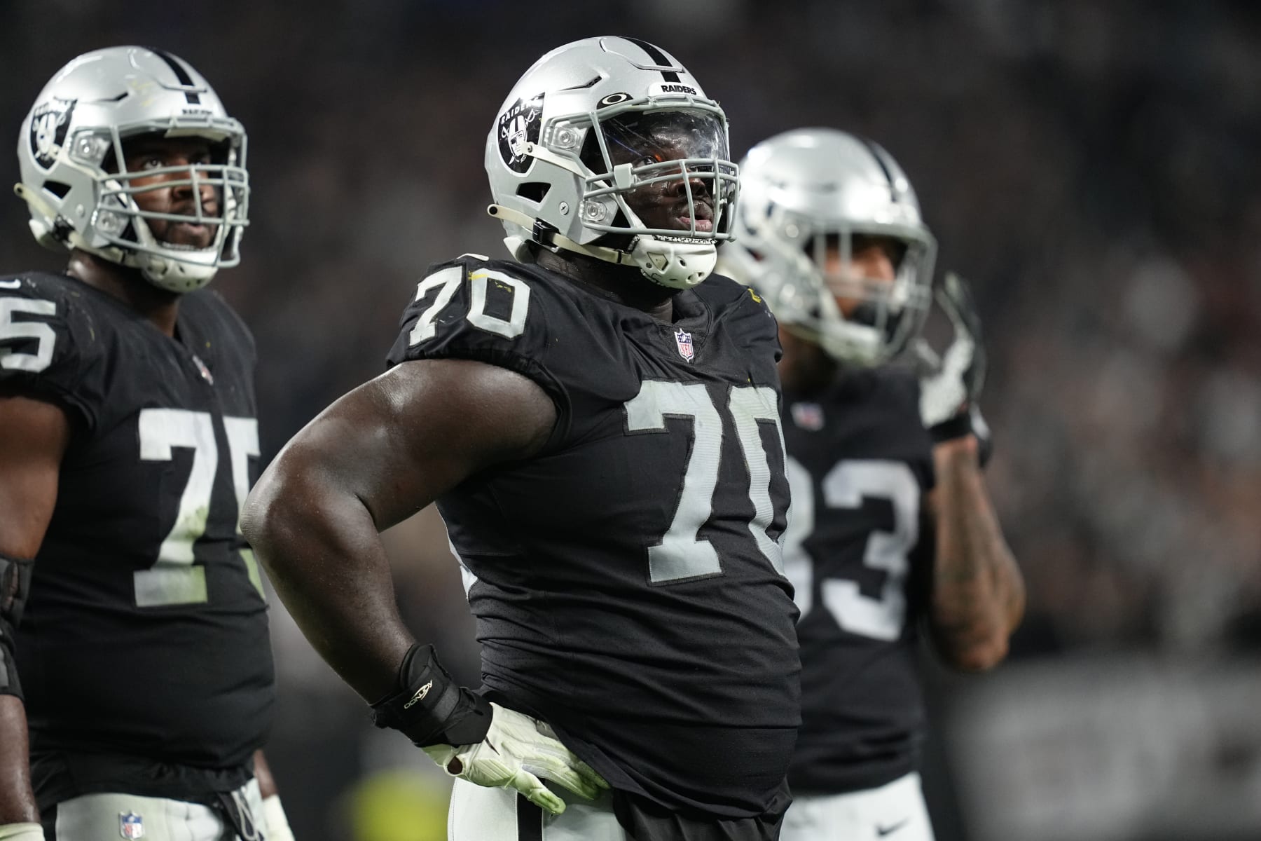 Las Vegas Raiders guard Alex Leatherwood (70) is seen on the sideline during the second half of an NFL football game against the Los Angeles Chargers, Sunday, Jan. 9, 2022, in Las Vegas. (AP Photo/Jeff Bottari) Las Vegas Raiders guard Alex Leatherwood (70) is seen on the sideline during the second half of an NFL football game against the Los Angeles Chargers, Sunday, Jan. 9, 2022, in Las Vegas. (AP Photo/Jeff Bottari)