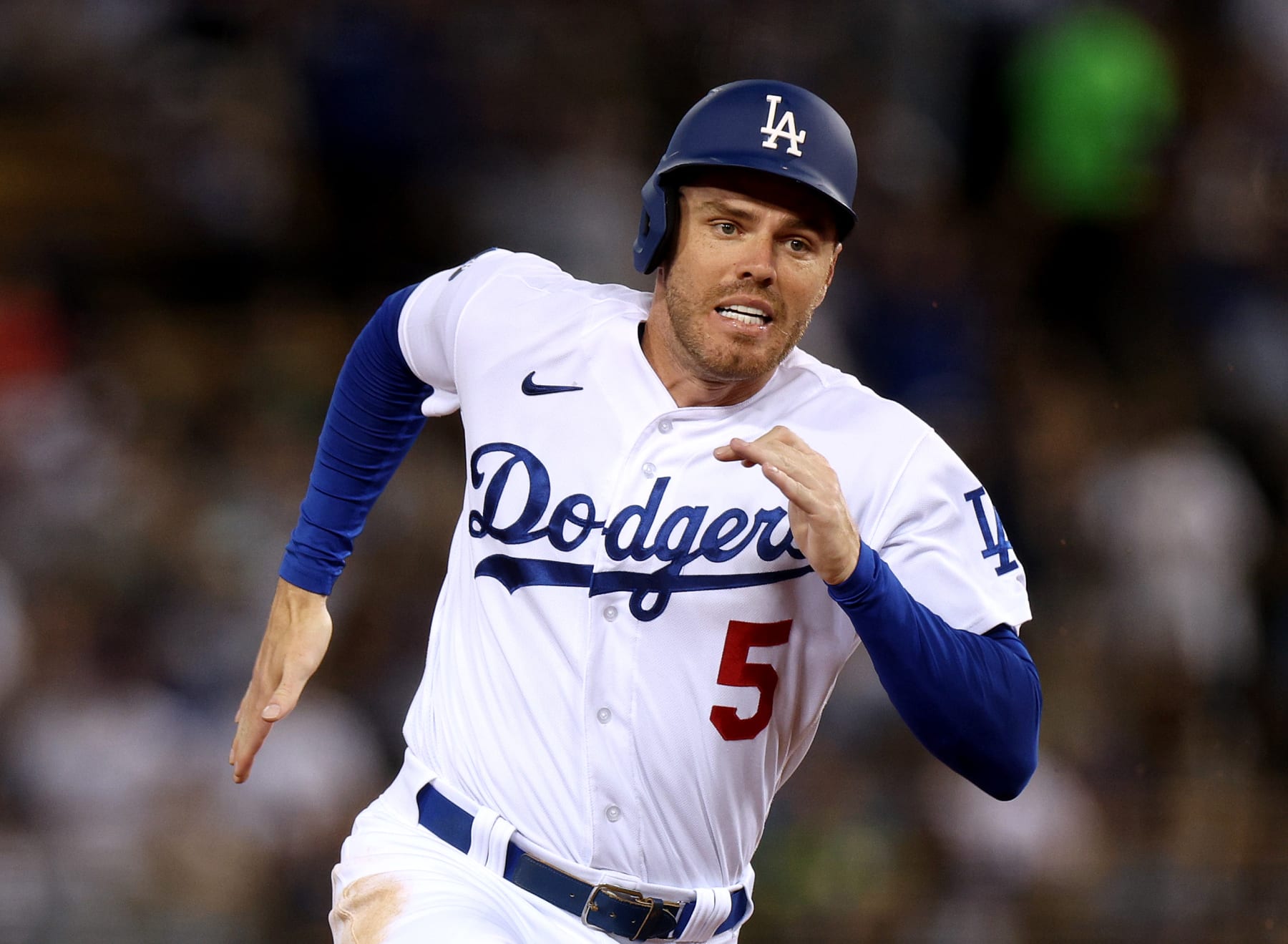 LOS ANGELES, CALIFORNIA - AUGUST 05: Freddie Freeman #5 of the Los Angeles Dodgers goes from first to third during the game against the San Diego Padres at Dodger Stadium on August 05, 2022 in Los Angeles, California. (Photo by Harry How/Getty Images)
