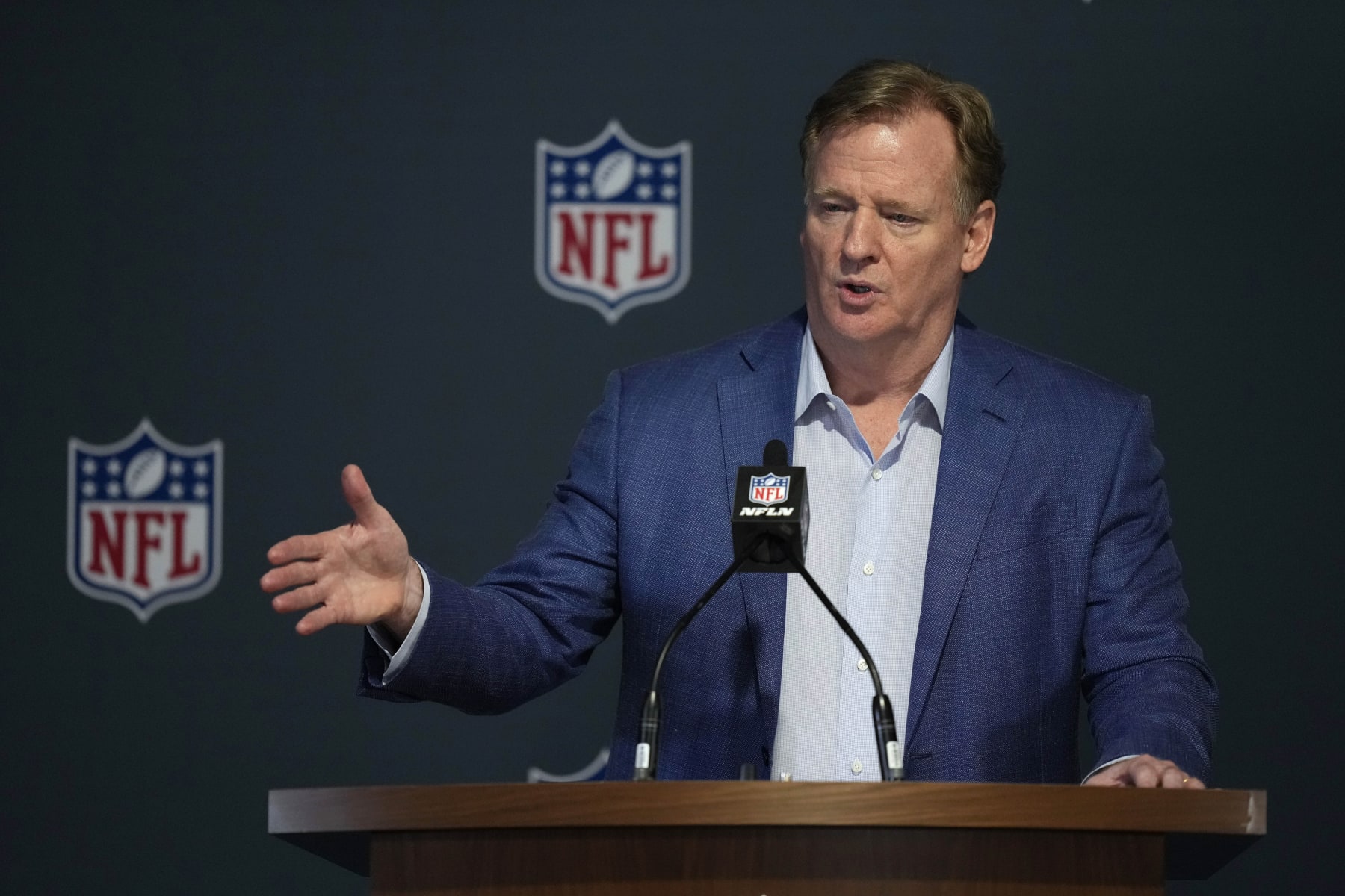 FILE -NFL CommissionerRoger Goodell answers questions from reporters at a press conference following the close of the NFL owner's meeting, Tuesday, March 29, 2022, at The Breakers resort in Palm Beach, Fla. The NFL has expanded the Rooney Rule again, this time to include quarterbacks coaches in a further effort to diversify the coaching ranks. The change was announced Tuesday, May 24, 2022 at the owners meeting in Atlanta. (AP Photo/Rebecca Blackwell, File)