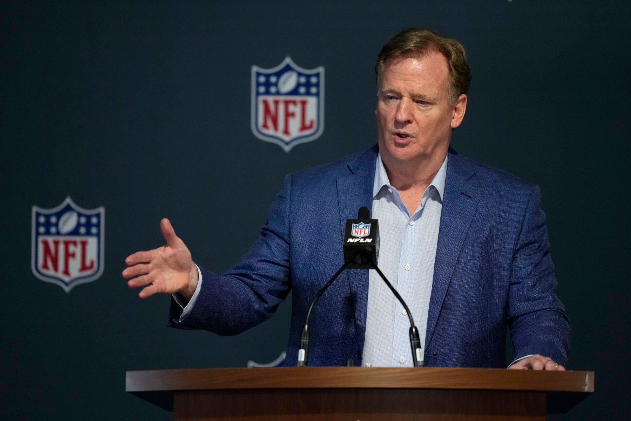 FILE -NFL CommissionerRoger Goodell answers questions from reporters at a press conference following the close of the NFL owner's meeting, Tuesday, March 29, 2022, at The Breakers resort in Palm Beach, Fla. The NFL has expanded the Rooney Rule again, this time to include quarterbacks coaches in a further effort to diversify the coaching ranks. The change was announced Tuesday, May 24, 2022 at the owners meeting in Atlanta. (AP Photo/Rebecca Blackwell, File)