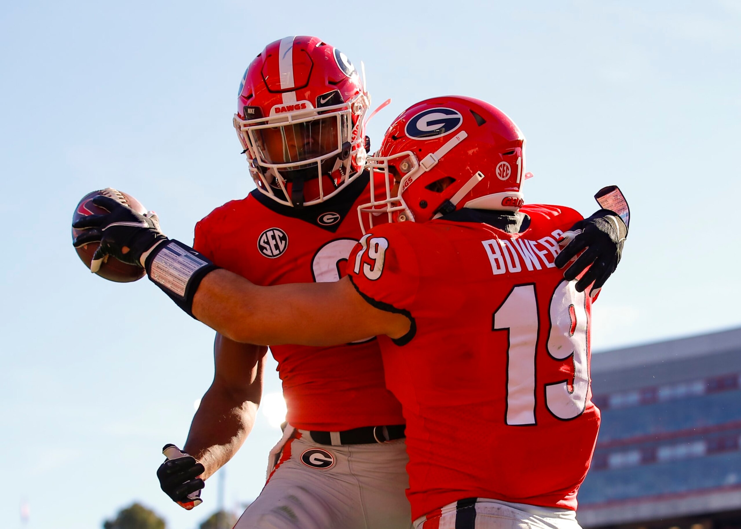 ATHENS, GA - NOVEMBER 20: Brock Bowers #19 celebrates a touchdown with Kenny McIntosh #6 of the Georgia Bulldogs during the first half against the Charleston Southern Buccaneers at Sanford Stadium on November 20, 2021 in Athens, Georgia. (Photo by Todd Kirkland/Getty Images)