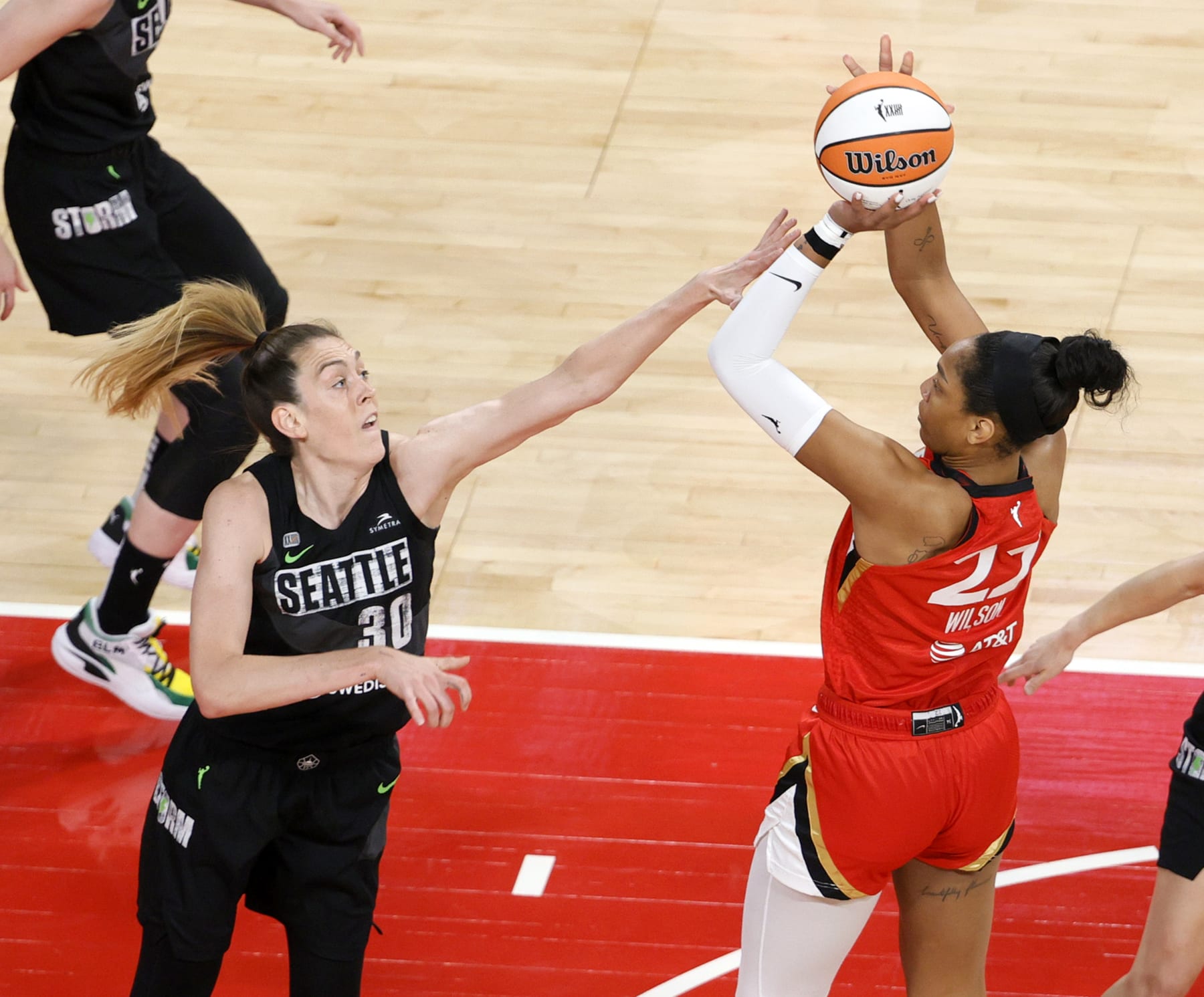 LAS VEGAS, NEVADA - JUNE 27:  A'ja Wilson #22 of the Las Vegas Aces shoots against Breanna Stewart #30 of the Seattle Storm during their game at Michelob ULTRA Arena on June 27, 2021 in Las Vegas, Nevada. The Aces defeated the Storm 95-92 in overtime. NOTE TO USER: User expressly acknowledges and agrees that, by downloading and or using this photograph, User is consenting to the terms and conditions of the Getty Images License Agreement.  (Photo by Ethan Miller/Getty Images)