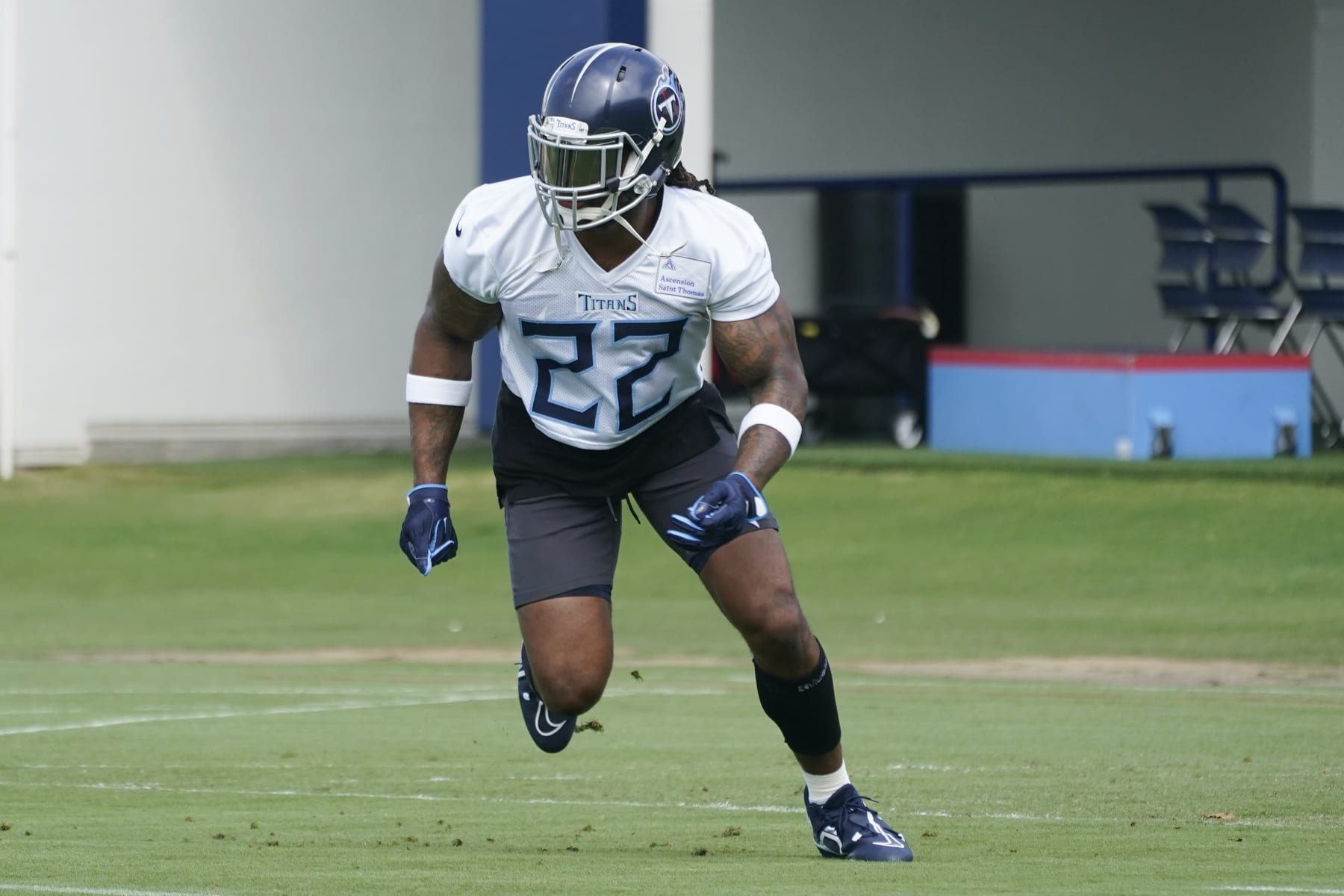 Tennessee Titans running back Derrick Henry takes part in a drill at the NFL football team's practice facility Tuesday, June 14, 2022, in Nashville, Tenn. (AP Photo/Mark Humphrey)