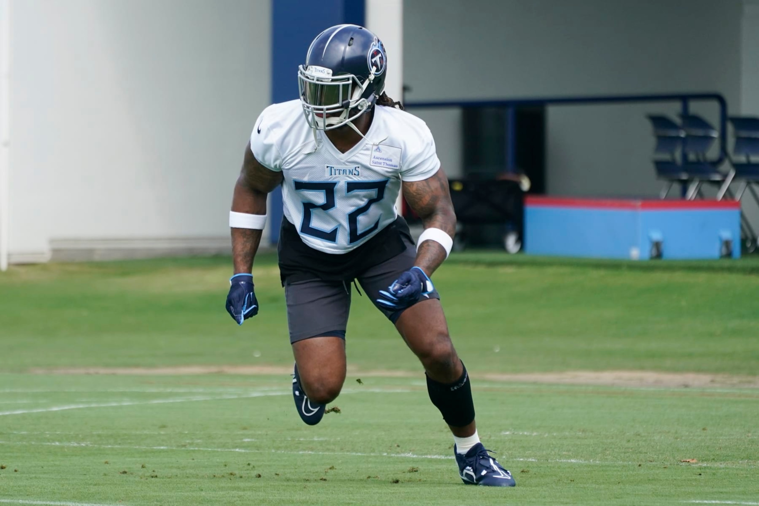 Tennessee Titans running back Derrick Henry takes part in a drill at the NFL football team's practice facility Tuesday, June 14, 2022, in Nashville, Tenn. (AP Photo/Mark Humphrey)