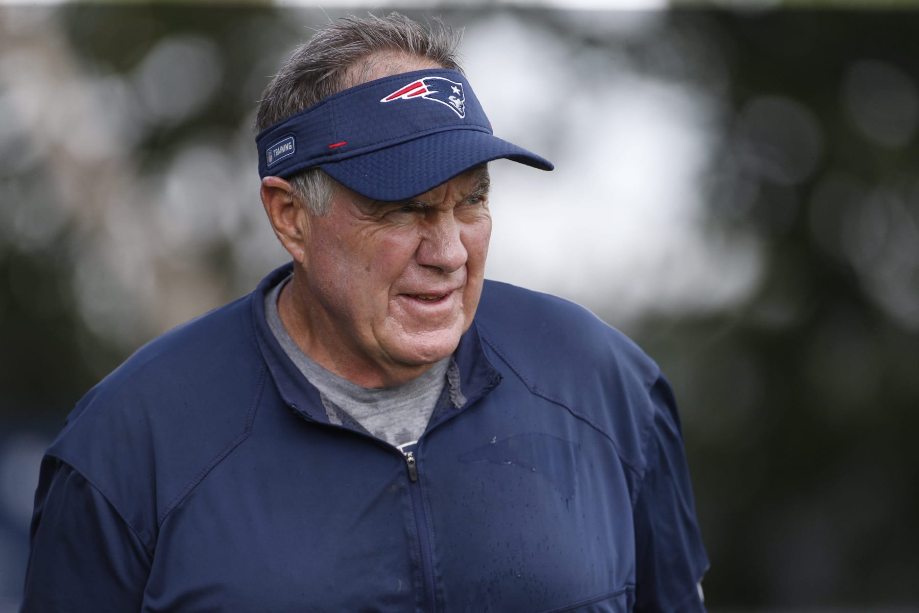 Foxborough, MA - August 8: Patriots head coach Bill Belichick walks onto the practice field at Patriots Training Camp at Gillette Stadium. (Photo by Carlin Stiehl for The Boston Globe via Getty Images)