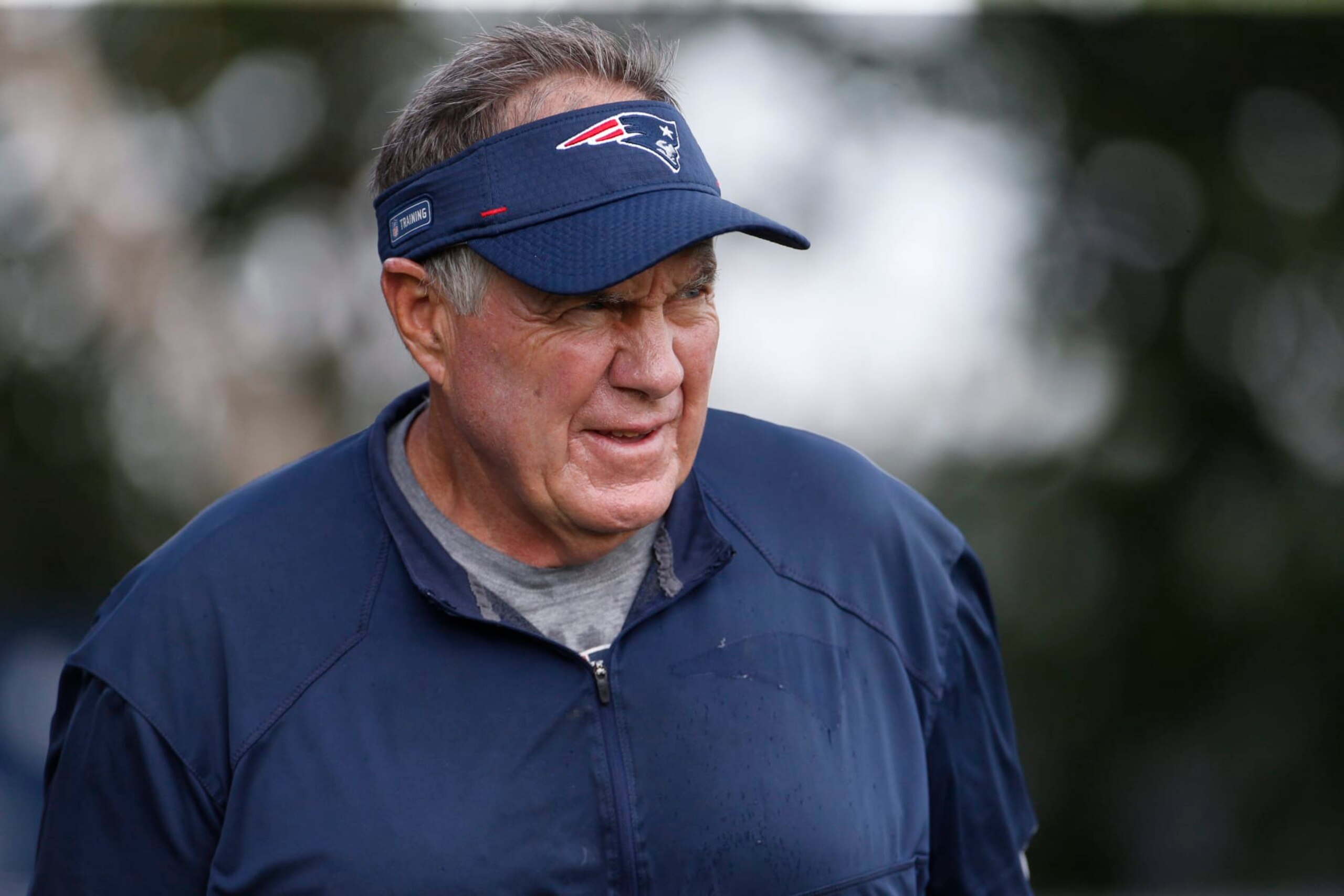 Foxborough, MA - August 8: Patriots head coach Bill Belichick walks onto the practice field at Patriots Training Camp at Gillette Stadium. (Photo by Carlin Stiehl for The Boston Globe via Getty Images)