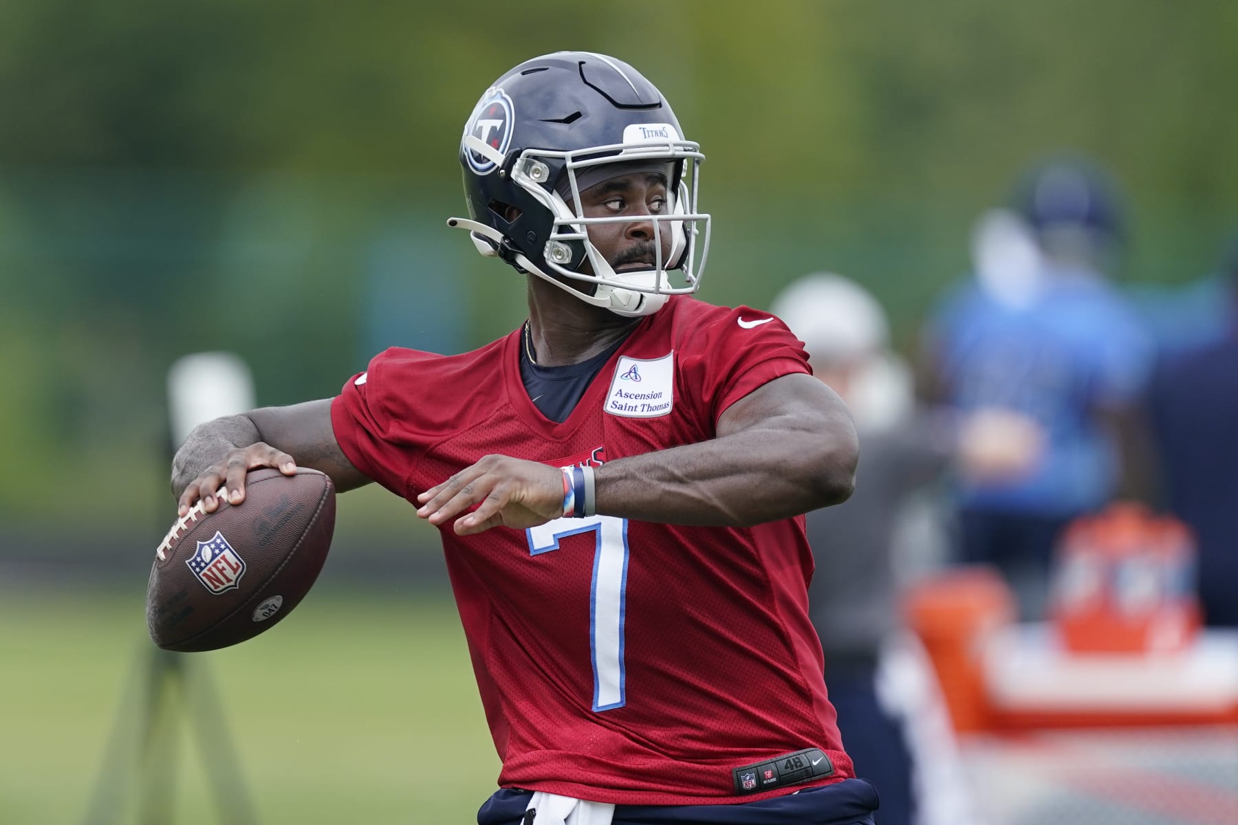 Tennessee Titans quarterback Malik Willis takes part in drills during training camp at the NFL football team's practice facility Thursday, July 28, 2022, in Nashville, Tenn. (AP Photo/Mark Humphrey)