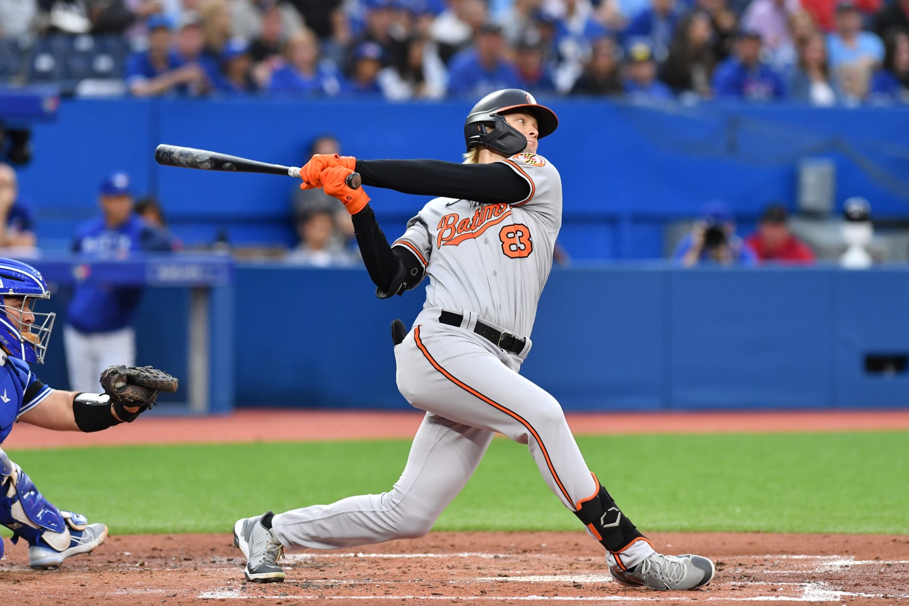 TORONTO, ON - JUNE 13: Baltimore Orioles Left Fielder Kyle Stowers (83) hits a pop fly ball into the outfield during the MLB regular season game between the Baltimore Orioles and the Toronto Blue Jays on June 13, 2022, at Rogers Center in Toronto, ON, Canada. (Photo by Gavin Napier/Icon Sportswire via Getty Images)