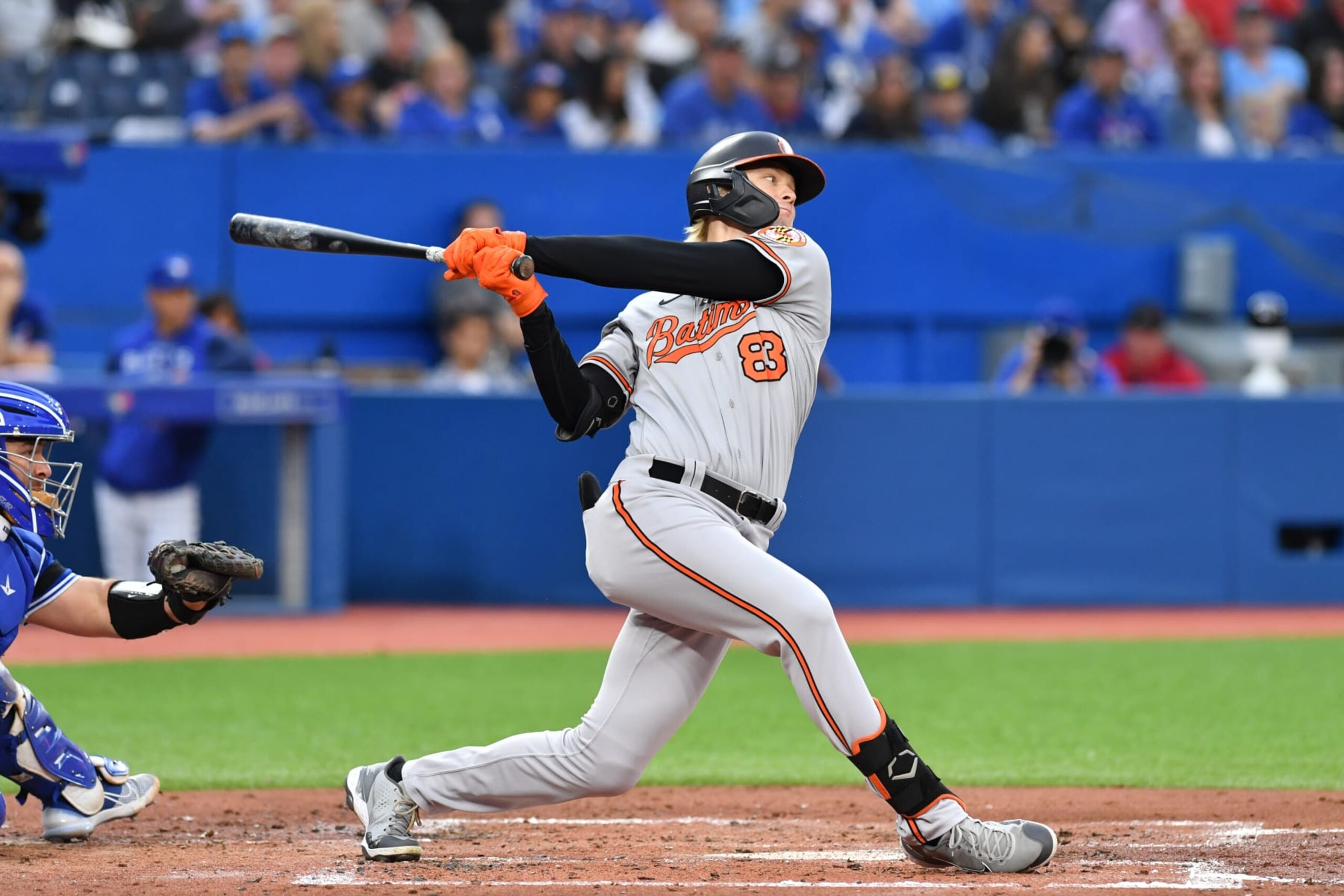 TORONTO, ON - JUNE 13: Baltimore Orioles Left Fielder Kyle Stowers (83) hits a pop fly ball into the outfield during the MLB regular season game between the Baltimore Orioles and the Toronto Blue Jays on June 13, 2022, at Rogers Center in Toronto, ON, Canada. (Photo by Gavin Napier/Icon Sportswire via Getty Images)