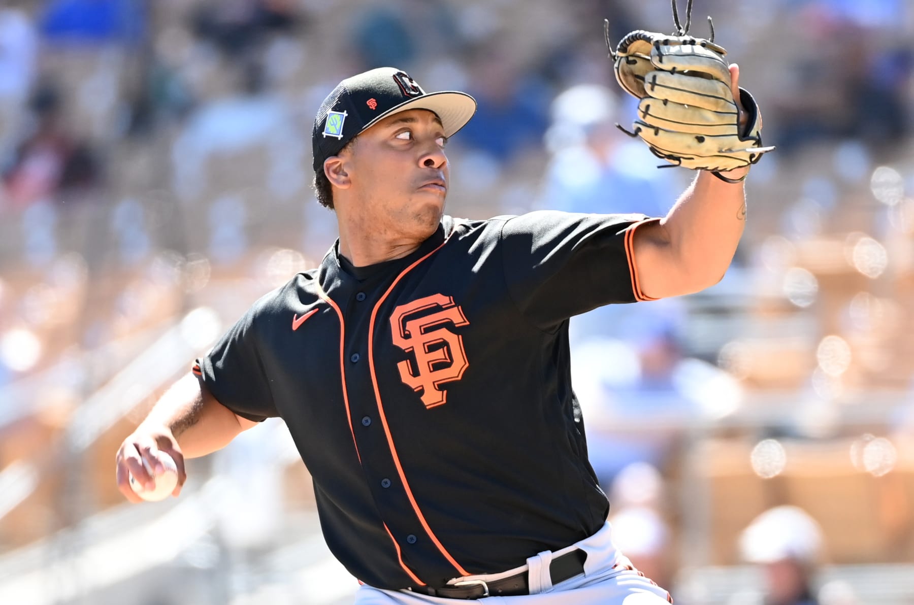 GLENDALE, ARIZONA - MARCH 24: Solomon Bates #98 of the San Francisco Giants delivers a pitch against the Chicago White Sox during a spring training game at Camelback Ranch on March 24, 2022 in Glendale, Arizona. (Photo by Norm Hall/Getty Images)