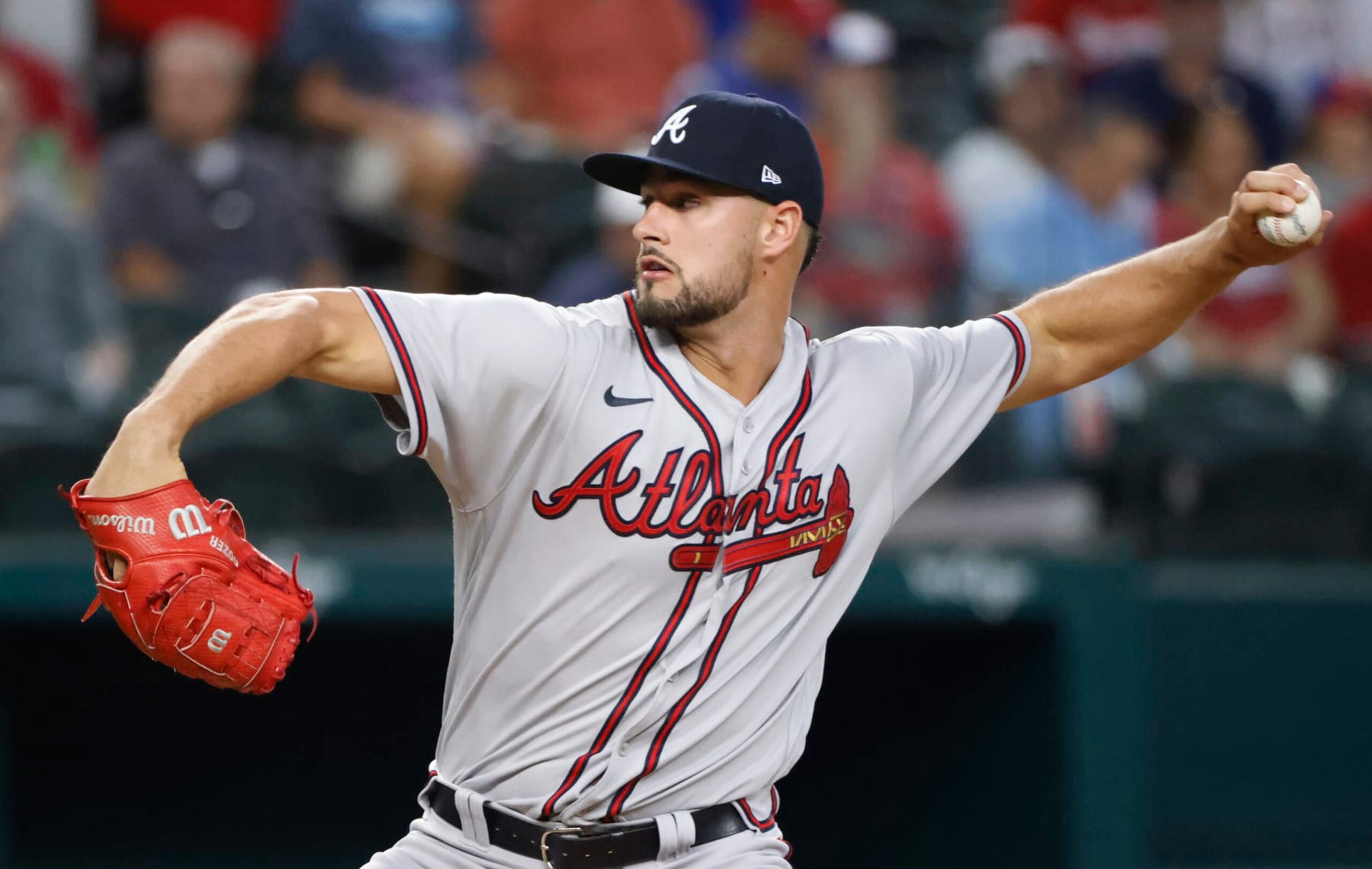 ARLINGTON, TX - MAY  1: Kyle Muller #66 of the Atlanta Braves pitches against the Texas Rangers during the first inning  at Globe Life Field on May 1, 2022 in Arlington, Texas. (Photo by Ron Jenkins/Getty Images)