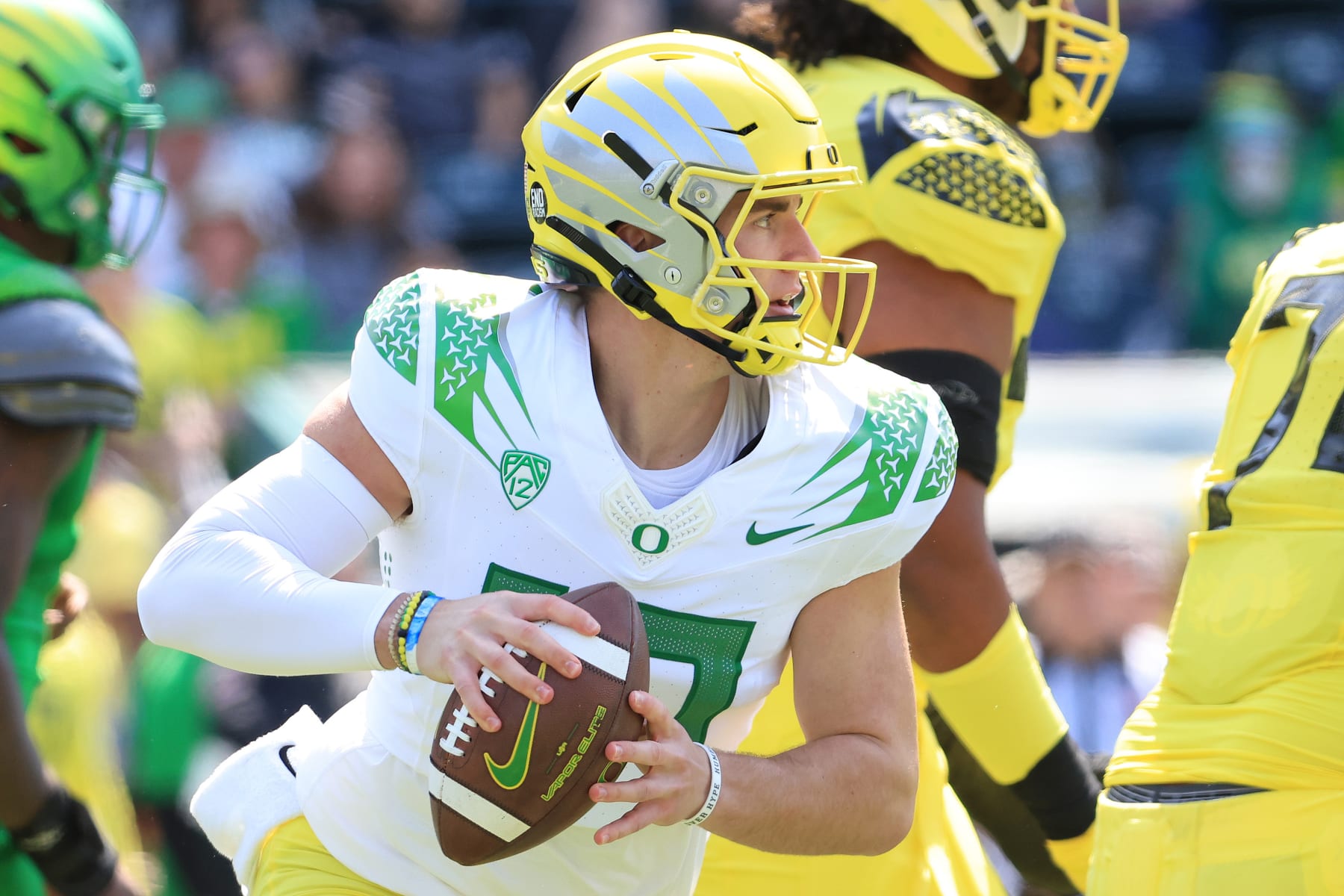 EUGENE, OREGON - APRIL 23: Bo Nix #10 of Team Yellow looks to pass the ball against Team Green during the third quarter of the Oregon Spring Game at Autzen Stadium on April 23, 2022 in Eugene, Oregon. (Photo by Abbie Parr/Getty Images)