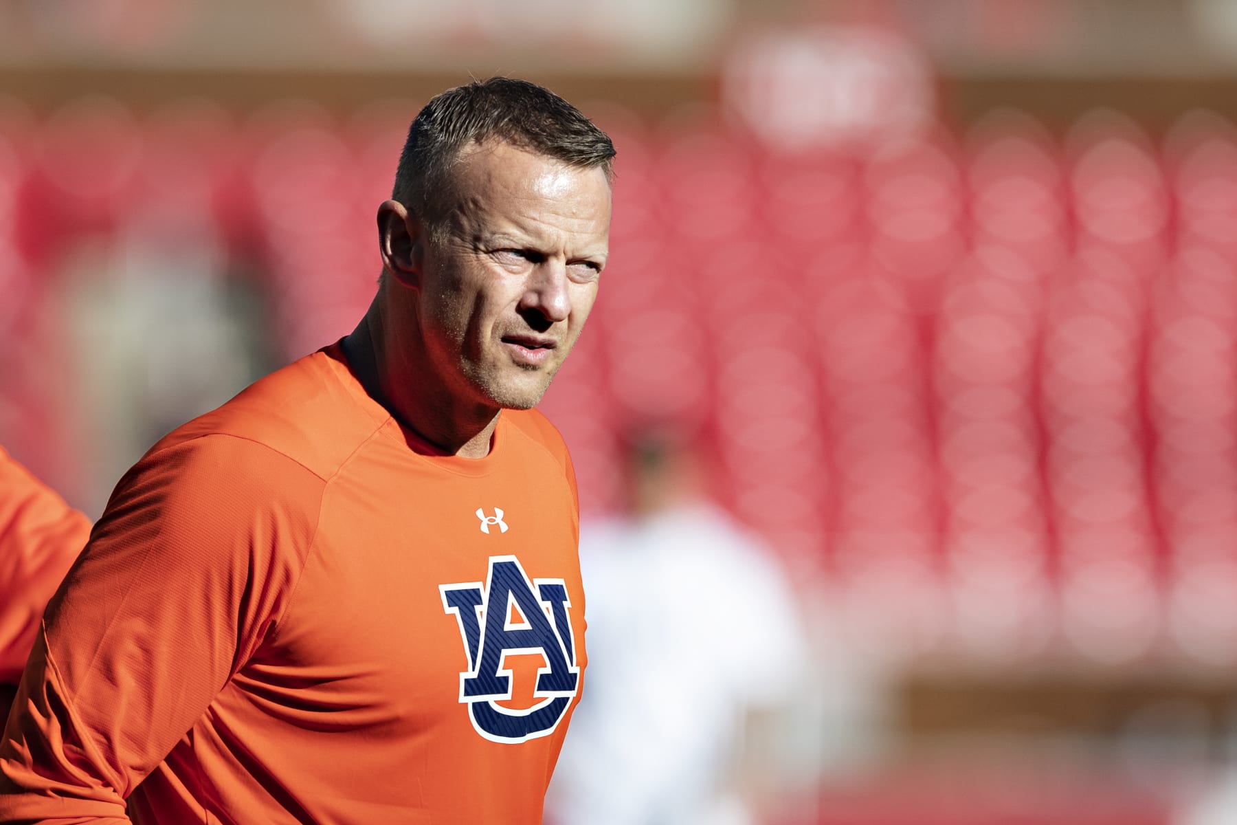 FAYETTEVILLE, ARKANSAS - OCTOBER 16:  Head Coach Bryan Harsin of the Auburn Tigers walks around the field before a game against the Arkansas Razorbacks at Donald W. Reynolds Stadium on October 16, 2021 in Fayetteville, Arkansas. The Tigers defeated the Razorbacks 38-23.  (Photo by Wesley Hitt/Getty Images)