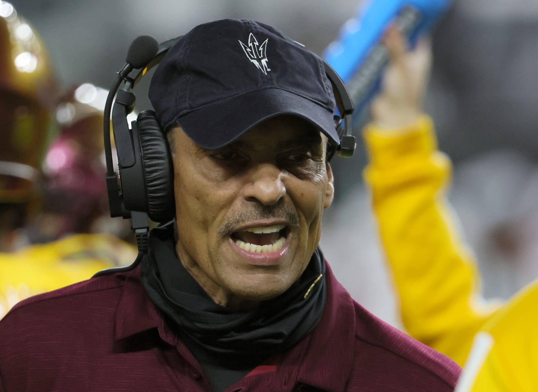 LAS VEGAS, NEVADA - DECEMBER 30:  Head coach Herm Edwards of the Arizona State Sun Devils talks to his team during a timeout in the SRS Distribution Las Vegas Bowl against the Wisconsin Badgers at Allegiant Stadium on December 30, 2021 in Las Vegas, Nevada. The Badgers defeated the Sun Devils 20-13.  (Photo by Ethan Miller/Getty Images)