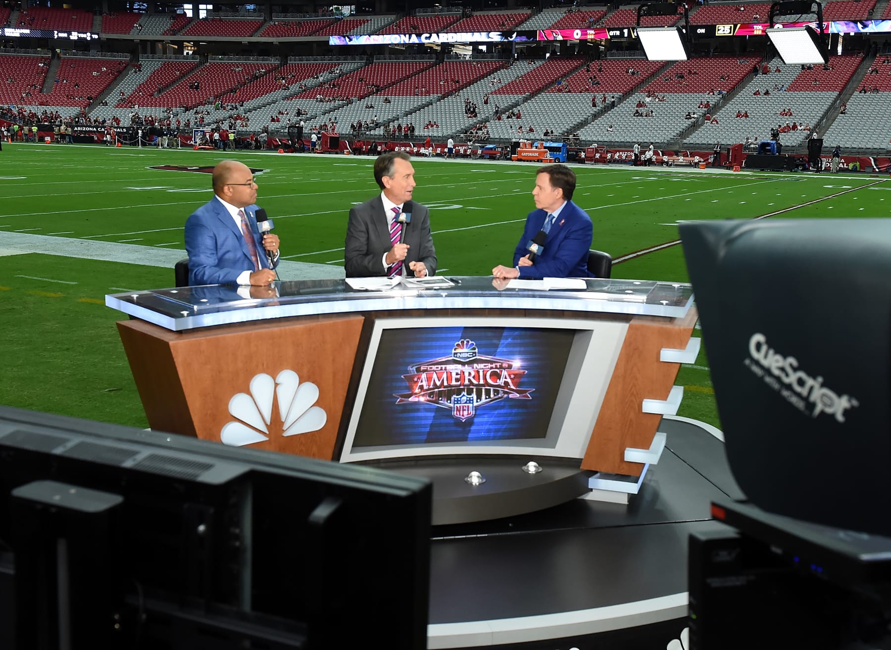GLENDALE, AZ - SEPTEMBER 11: Sunday Night Football Commentators Mike Tirico, Cris Collinsworth and Bob Costas report prior to the NFL game between the New England Patriots and Arizona Cardinals at University of Phoenix Stadium on September 11, 2016 in Glendale, Arizona.  (Photo by Norm Hall/Getty Images)