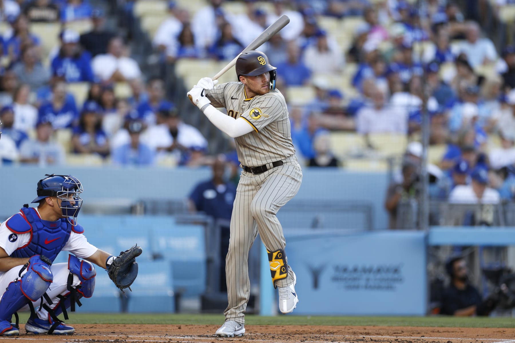 LOS ANGELES, CA - AUGUST 06: San Diego Padres third baseman Brandon Drury (17) waits for the pitch during a regular season game between the San Diego Padres and Los Angeles Dodgers on August 06, 2022, at Dodger Stadium in Los Angeles, CA. (Photo by Brandon Sloter/Icon Sportswire via Getty Images)
