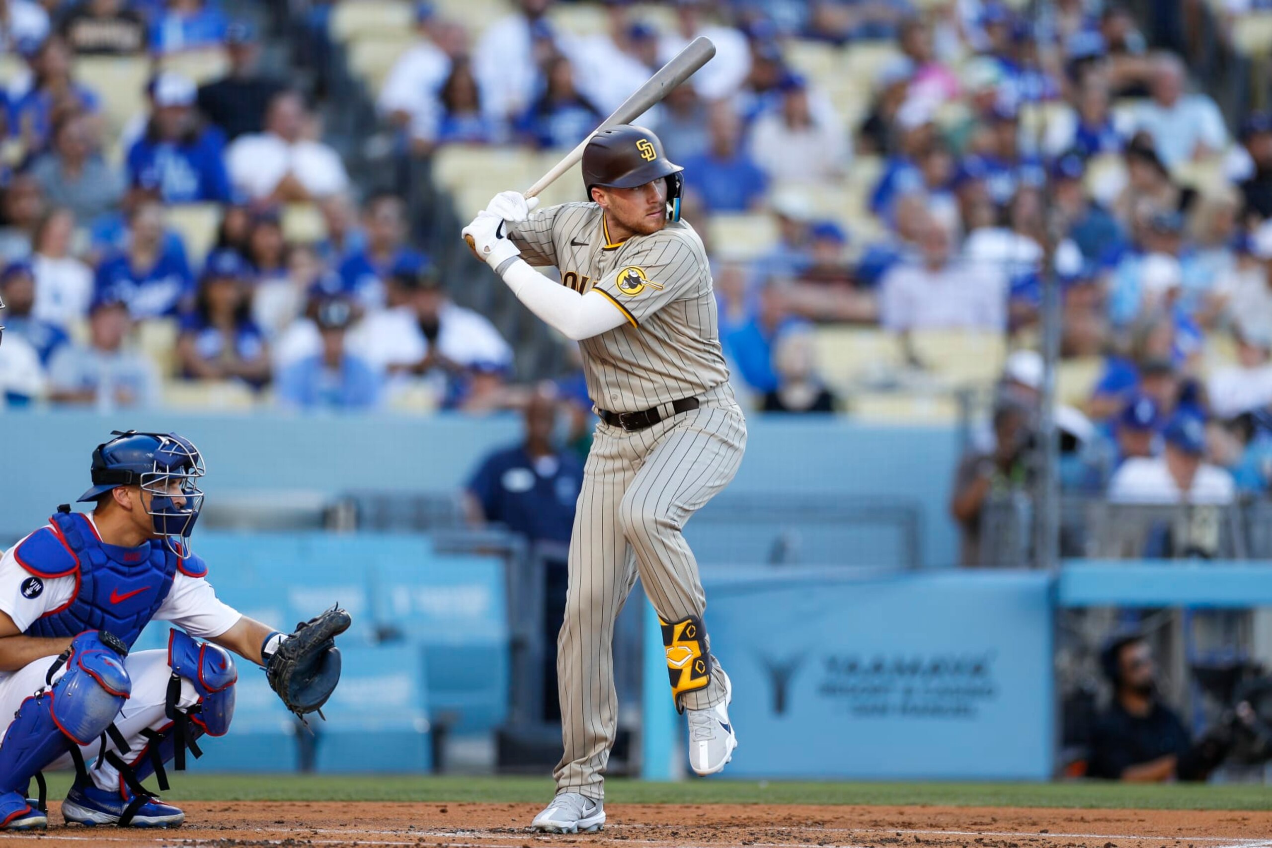 LOS ANGELES, CA - AUGUST 06: San Diego Padres third baseman Brandon Drury (17) waits for the pitch during a regular season game between the San Diego Padres and Los Angeles Dodgers on August 06, 2022, at Dodger Stadium in Los Angeles, CA. (Photo by Brandon Sloter/Icon Sportswire via Getty Images)