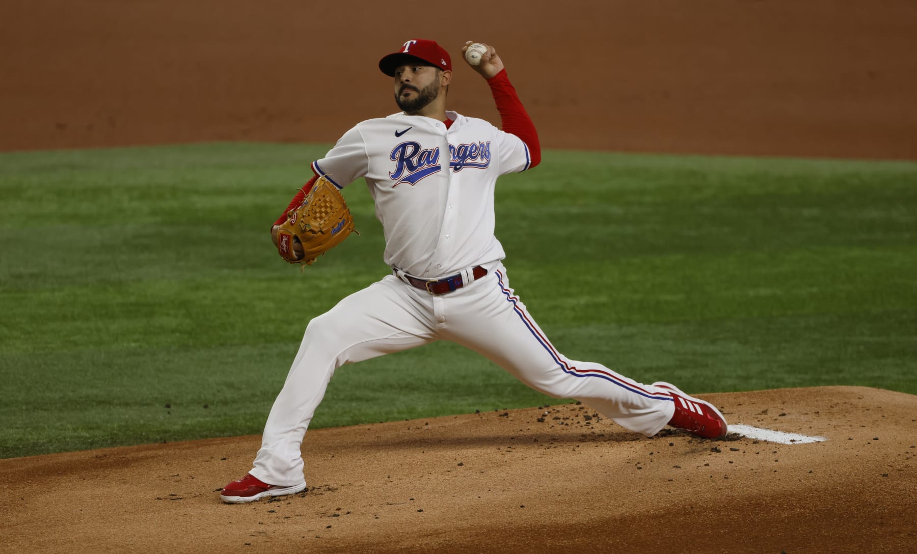 ARLINGTON, TX - AUGUST 3: Martin Perez #54 of the Texas Rangers pitches against the Baltimore Orioles during the first inning at Globe Life Field on August 3, 2022 in Arlington, Texas. (Photo by Ron Jenkins/Getty Images)