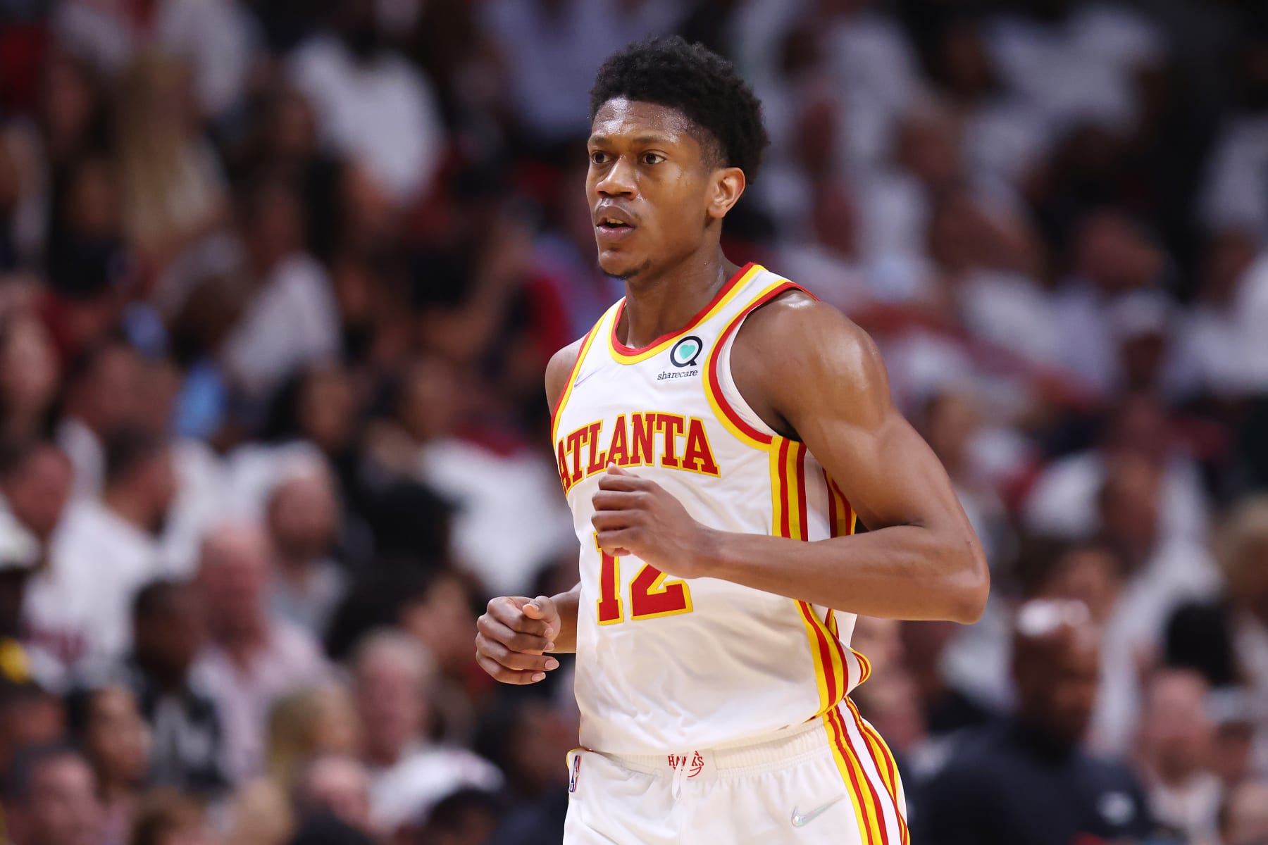 MIAMI, FLORIDA - APRIL 26: De'Andre Hunter #12 of the Atlanta Hawks looks on against the Miami Heat in Game Five of the Eastern Conference First Round at FTX Arena on April 26, 2022 in Miami, Florida. NOTE TO USER: User expressly acknowledges and agrees that, by downloading and or using this photograph, User is consenting to the terms and conditions of the Getty Images License Agreement.  (Photo by Michael Reaves/Getty Images)