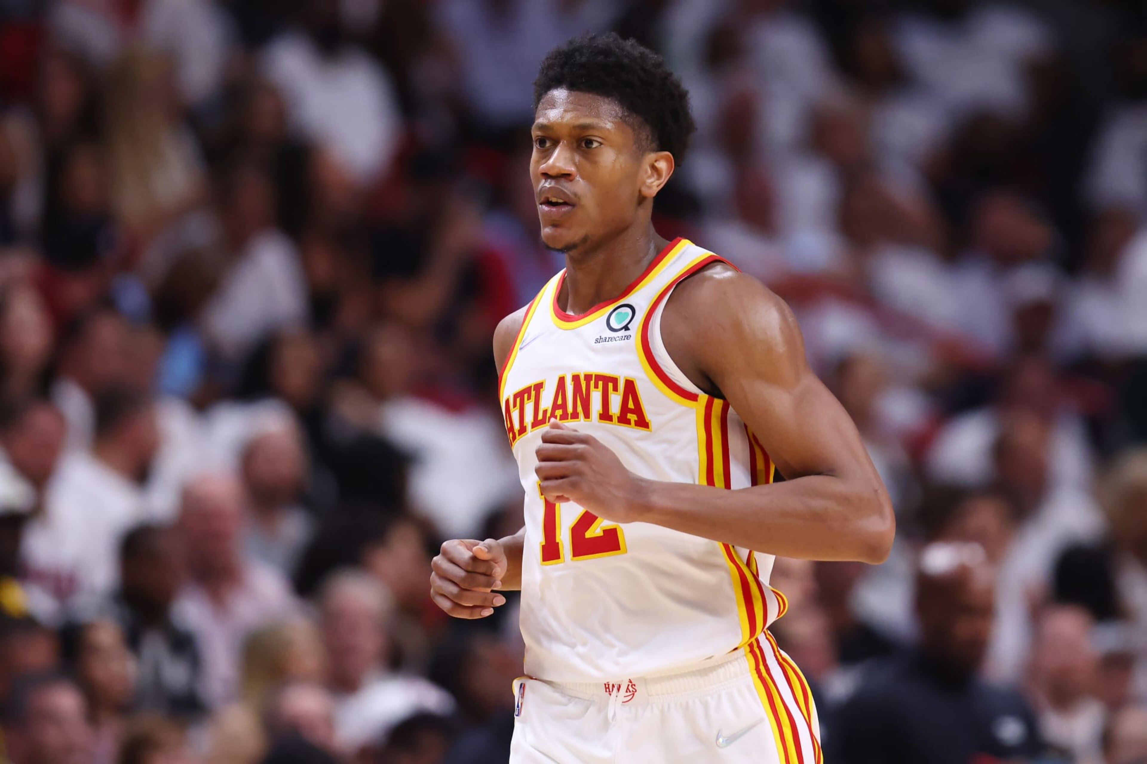 MIAMI, FLORIDA - APRIL 26: De'Andre Hunter #12 of the Atlanta Hawks looks on against the Miami Heat in Game Five of the Eastern Conference First Round at FTX Arena on April 26, 2022 in Miami, Florida. NOTE TO USER: User expressly acknowledges and agrees that, by downloading and or using this photograph, User is consenting to the terms and conditions of the Getty Images License Agreement. (Photo by Michael Reaves/Getty Images) MIAMI, FLORIDA - APRIL 26: De'Andre Hunter #12 of the Atlanta Hawks looks on against the Miami Heat in Game Five of the Eastern Conference First Round at FTX Arena on April 26, 2022 in Miami, Florida. NOTE TO USER: User expressly acknowledges and agrees that, by downloading and or using this photograph, User is consenting to the terms and conditions of the Getty Images License Agreement. (Photo by Michael Reaves/Getty Images)