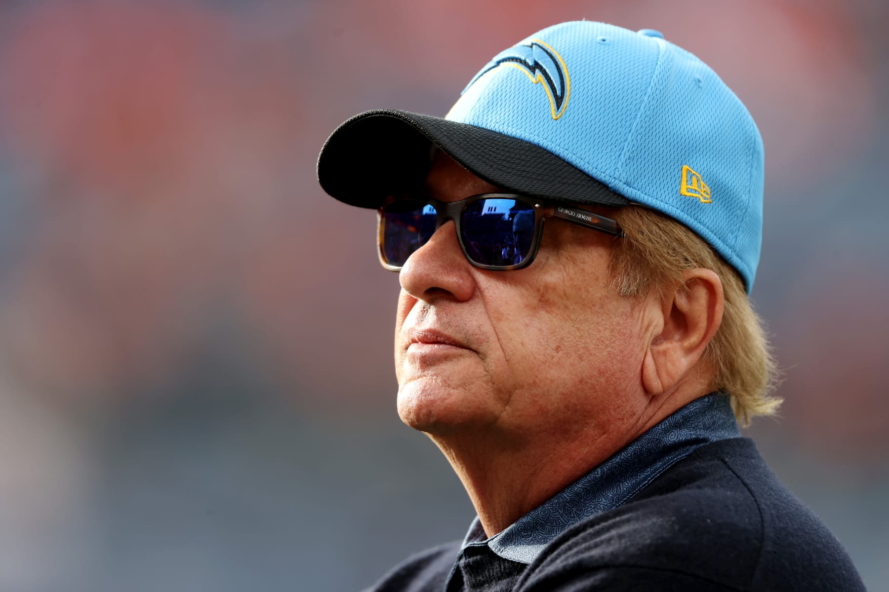 DENVER, COLORADO - NOVEMBER 28: Los Angeles Chargers Owner Dean Spanos looks on during warmups before the game against the Denver Broncos at Empower Field At Mile High on November 28, 2021 in Denver, Colorado. (Photo by Matthew Stockman/Getty Images)