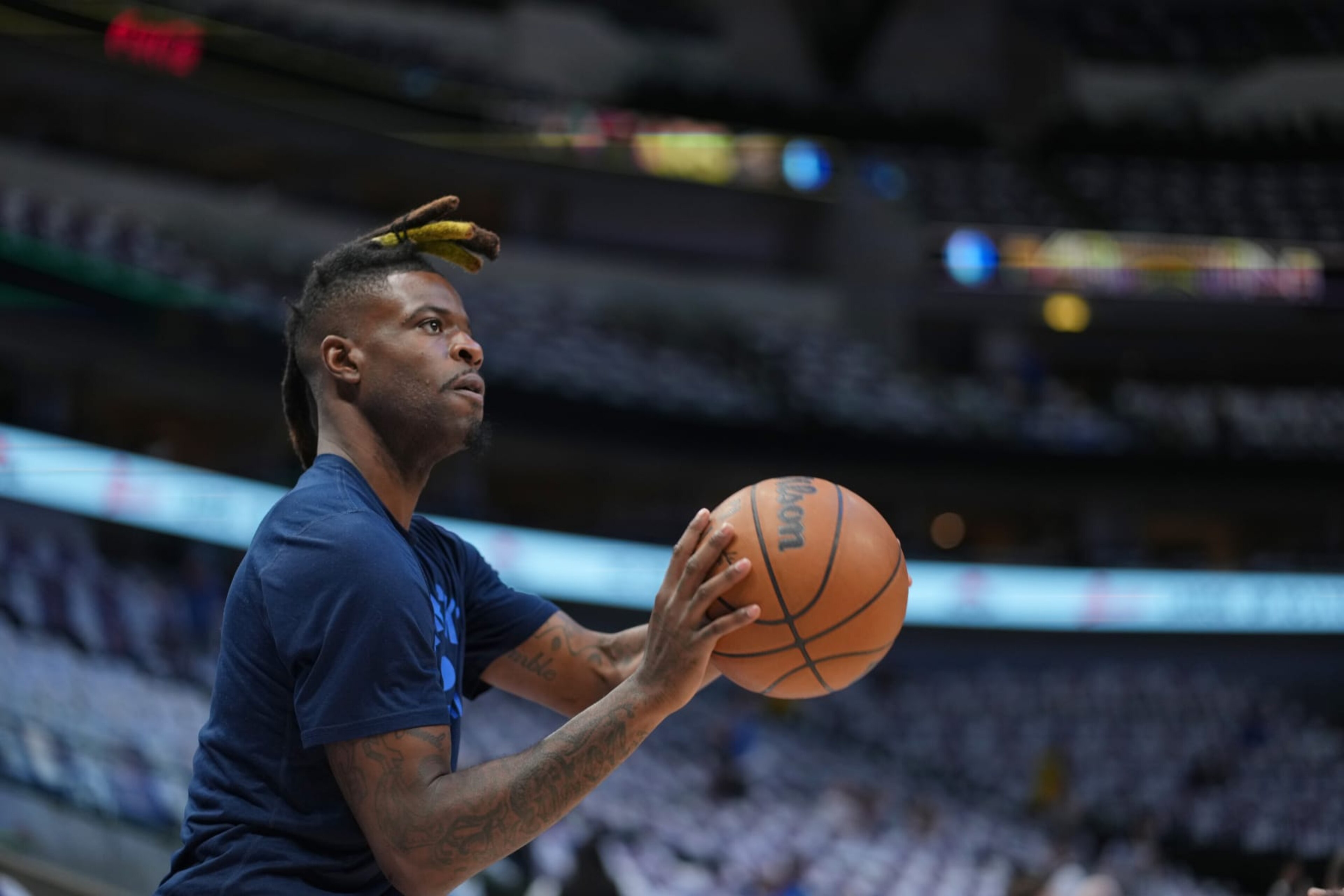 DALLAS, TX - MAY 24: Reggie Bullock #25 of the Dallas Mavericks warms up before Game 4 of the 2022 NBA Playoffs Western Conference Finals on May 24, 2022 at the American Airlines Center in Dallas, Texas. NOTE TO USER: User expressly acknowledges and agrees that, by downloading and or using this photograph, User is consenting to the terms and conditions of the Getty Images License Agreement. Mandatory Copyright Notice: Copyright 2022 NBAE (Photo by Cooper Neill/NBAE via Getty Images) DALLAS, TX - MAY 24: Reggie Bullock #25 of the Dallas Mavericks warms up before Game 4 of the 2022 NBA Playoffs Western Conference Finals on May 24, 2022 at the American Airlines Center in Dallas, Texas. NOTE TO USER: User expressly acknowledges and agrees that, by downloading and or using this photograph, User is consenting to the terms and conditions of the Getty Images License Agreement. Mandatory Copyright Notice: Copyright 2022 NBAE (Photo by Cooper Neill/NBAE via Getty Images)