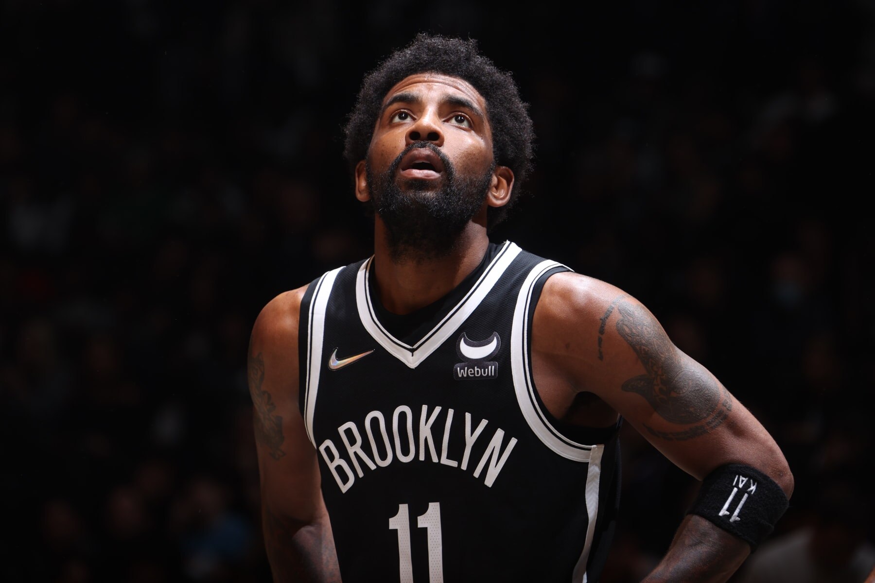 BROOKLYN, NY - APRIL 23: Kyrie Irving #11 of the Brooklyn Nets looks on against the Boston Celtics during Round 1 Game 3 of the 2022 NBA Playoffs on April 23, 2022 at Barclays Center in Brooklyn, New York. NOTE TO USER: User expressly acknowledges and agrees that, by downloading and or using this Photograph, user is consenting to the terms and conditions of the Getty Images License Agreement. Mandatory Copyright Notice: Copyright 2022 NBAE (Photo by Nathaniel S. Butler/NBAE via Getty Images)